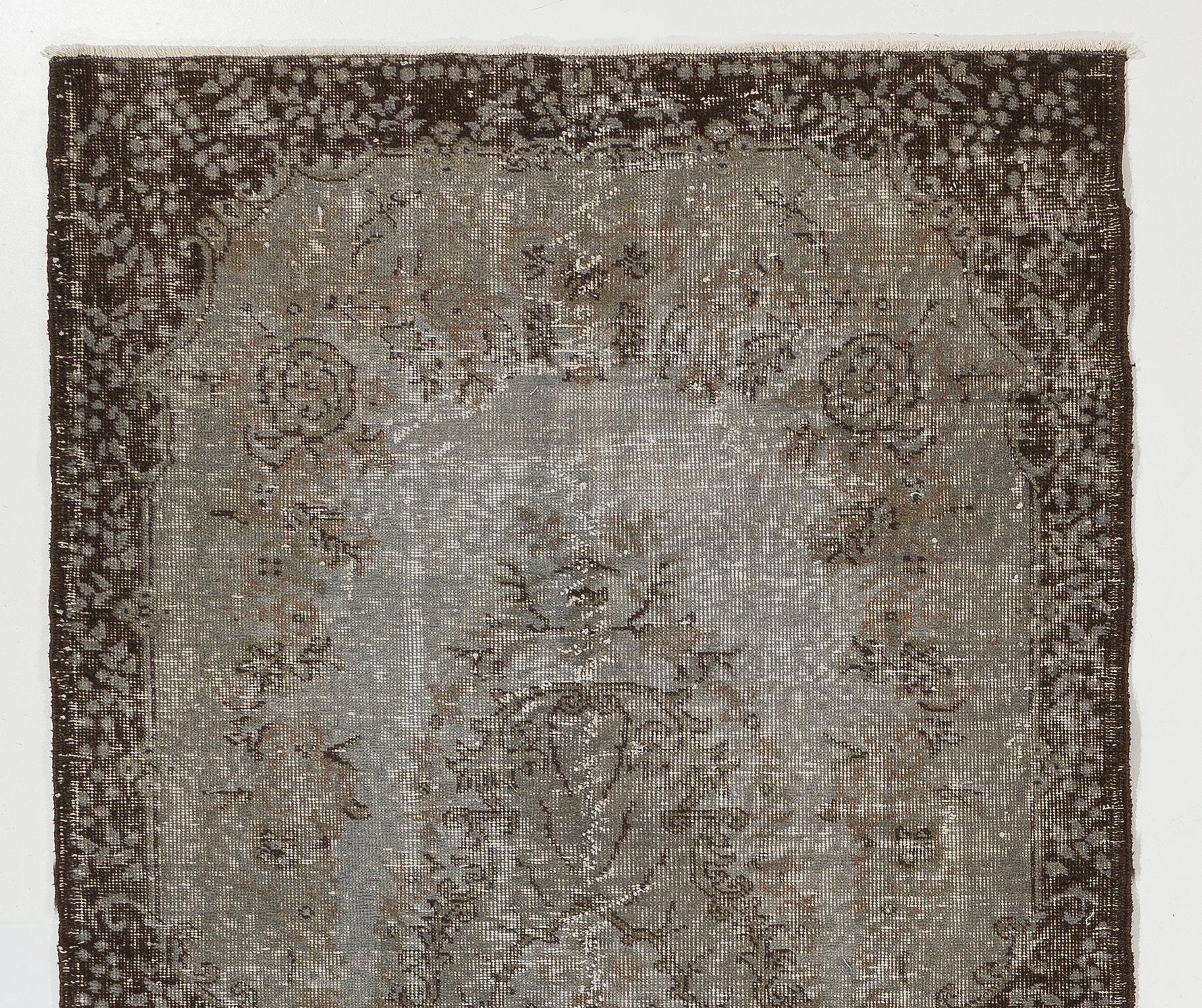 A vintage Turkish accent rug with a baroque design over-dyed in gray, great for contemporary interiors with a touch of color.

It is finely hand-knotted with low wool pile on cotton foundation, in good condition, professionally washed, sturdy and