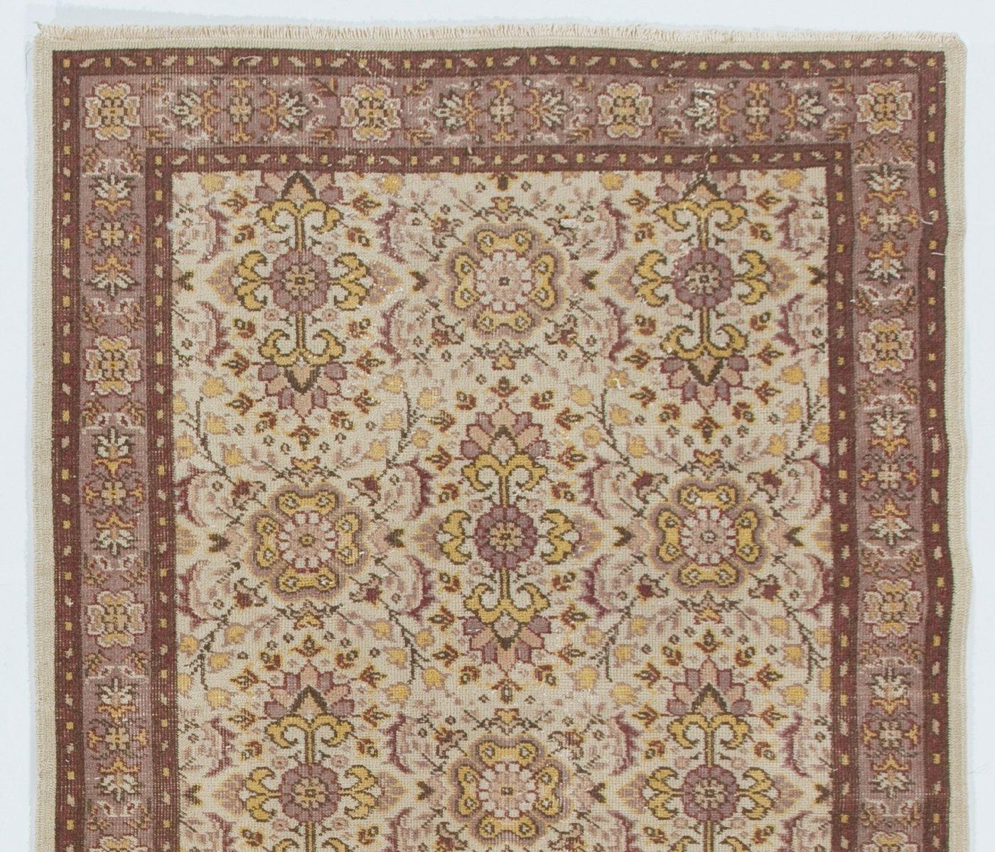 A vintage hand-knotted accent rug from Central Turkey. Finely hand-knotted with even medium wool pile on cotton foundation. Very good condition. Sturdy and as clean as a brand new rug (deep washed professionally). 
Size: 4 x 7 ft.
  