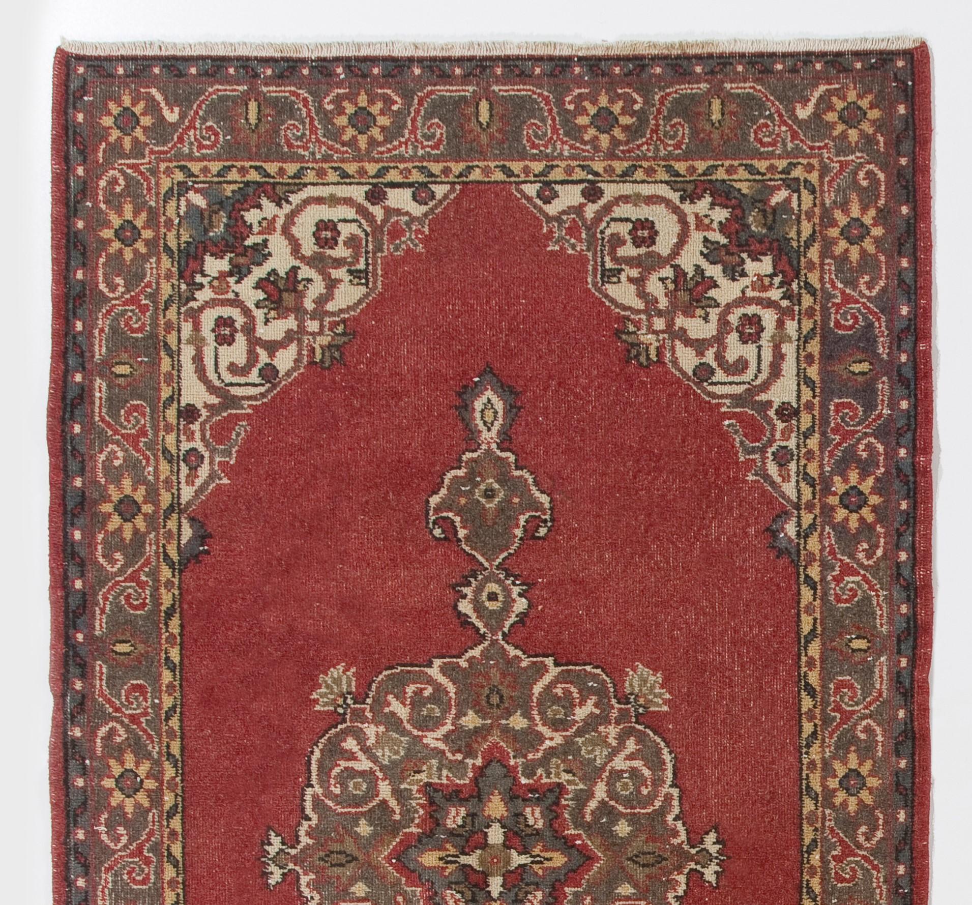 A vintage Turkish accent rug. Finely hand-knotted with even medium wool pile on cotton foundation. Very good condition. Sturdy and as clean as a brand new rug (deep washed professionally). 
Measures: 4x7.4 Ft.
