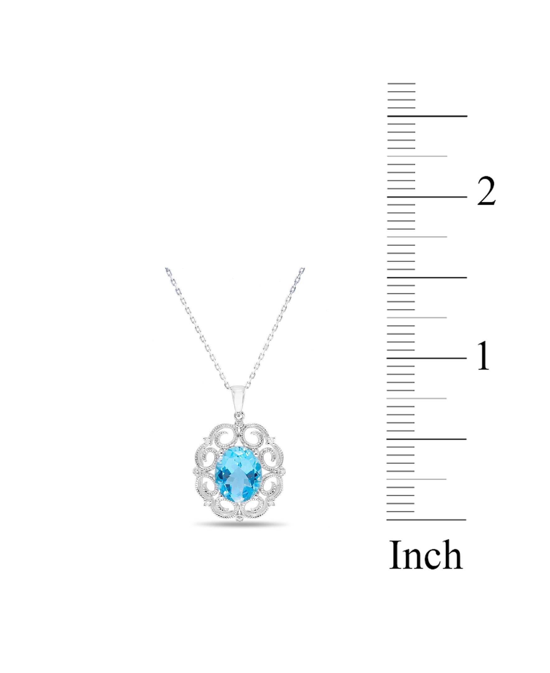 Oval Cut 5-1/2 ct. Swiss Blue Topaz and Diamond Accent Sterling Silver Pendant Necklace For Sale