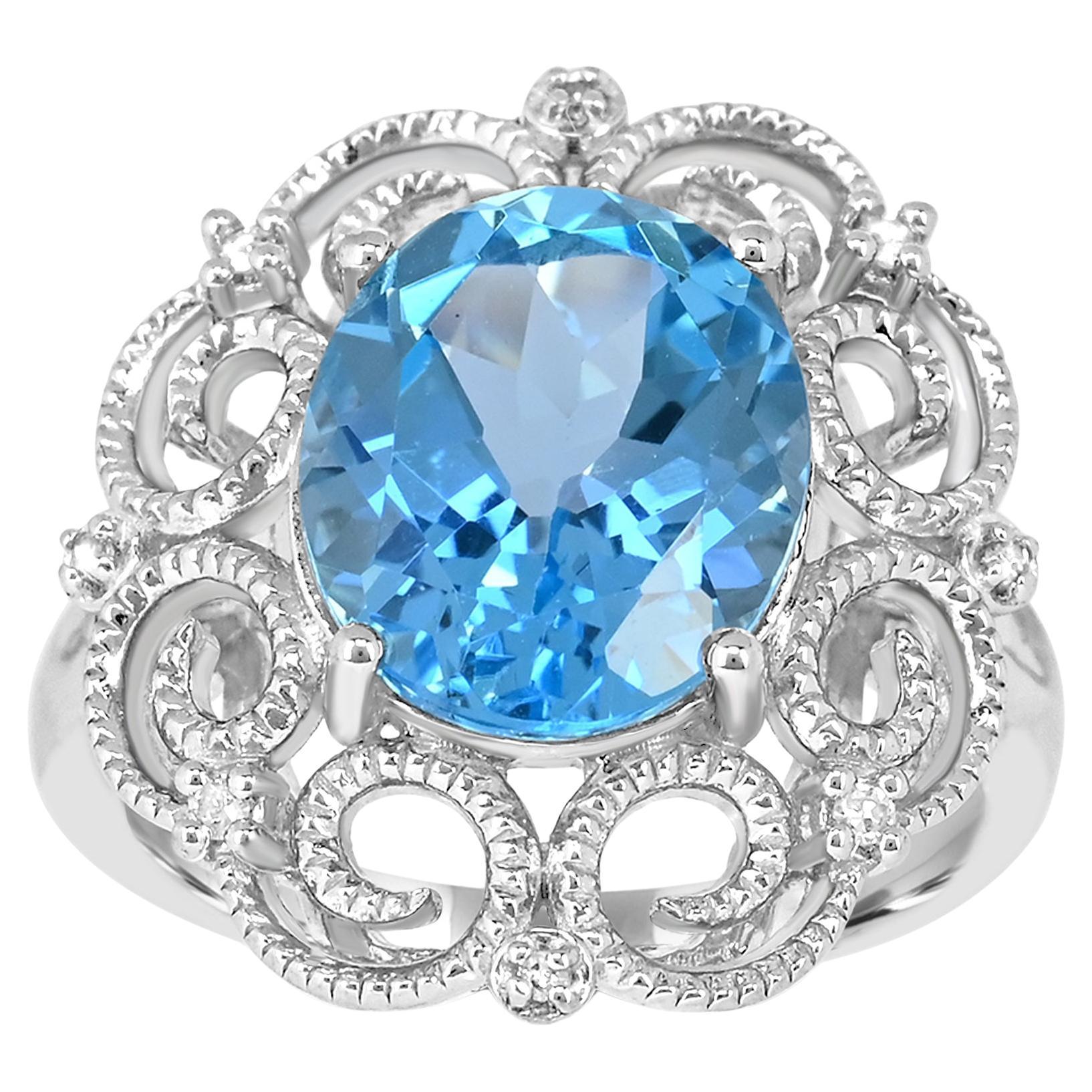 5-1/2 ct. Bague en argent sterling avec topaze bleue suisse et diamants en bordure rétro en vente