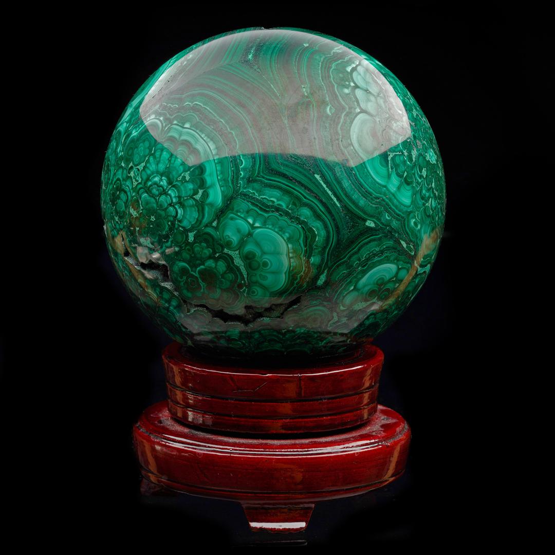 This hefty sphere of AAA-quality malachite with gorgeous color and natural patterns including a plethora of beautifully defined bullseyes comes from the DRC and has been expertly hand-polished to a gleaming luster to further enhance the incredible