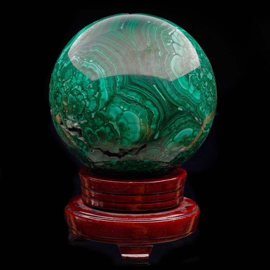 This hefty sphere of AAA-quality malachite with gorgeous color and natural patterns including a plethora of beautiful bullseyes comes from the DRC and has been expertly hand-polished to a gleaming luster to further enhance the incredible