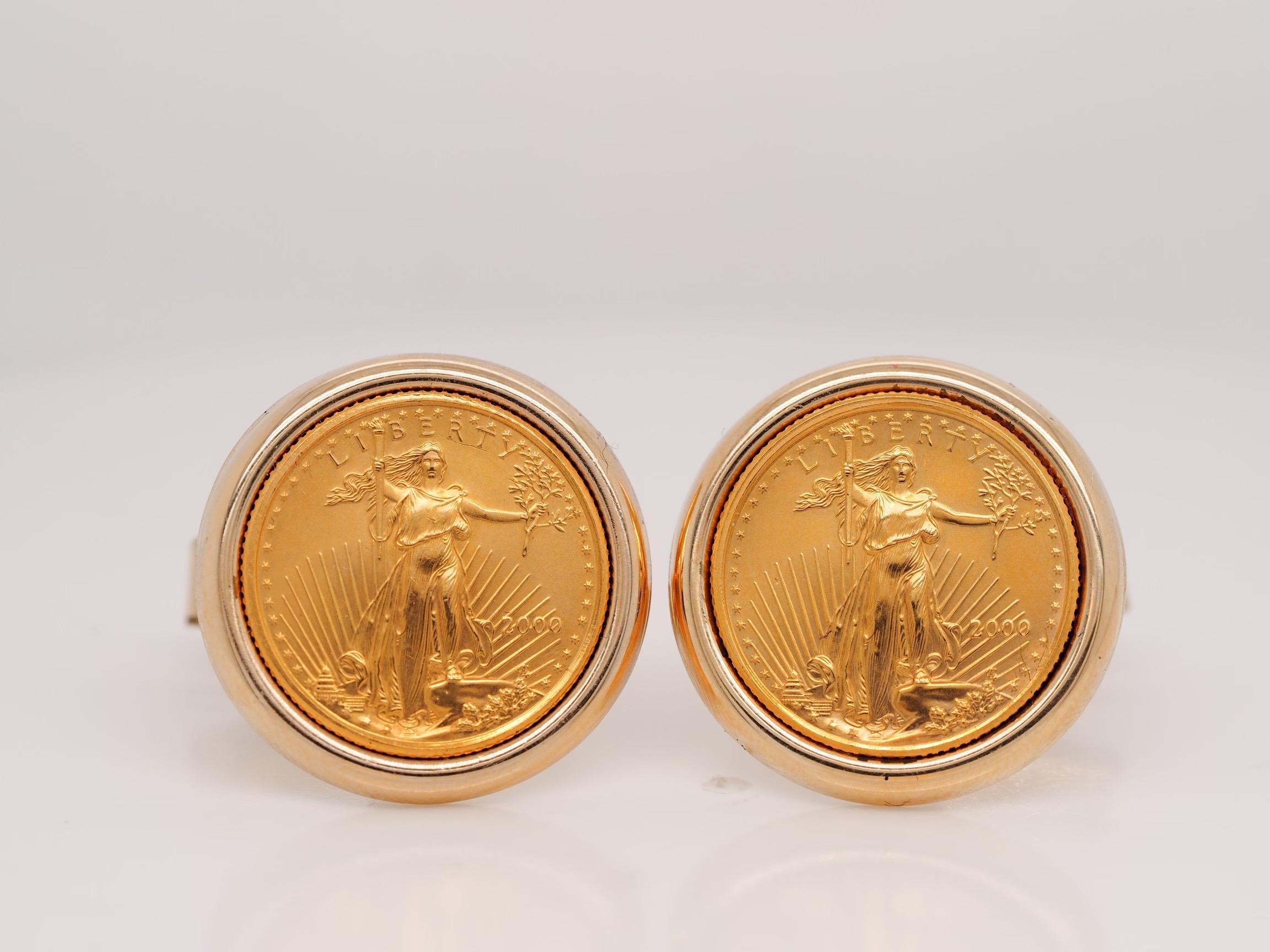 These cufflinks are a perfect statement piece! 

2 Piece set with 1/10 Amercian eagle coins bezel set and framed in 14 karat yellow gold setting


Metal: 14K Yellow Gold

Stamps: 14K

Weight: 13.5 grams 

Size: 20.5mm

Condition: In excellent