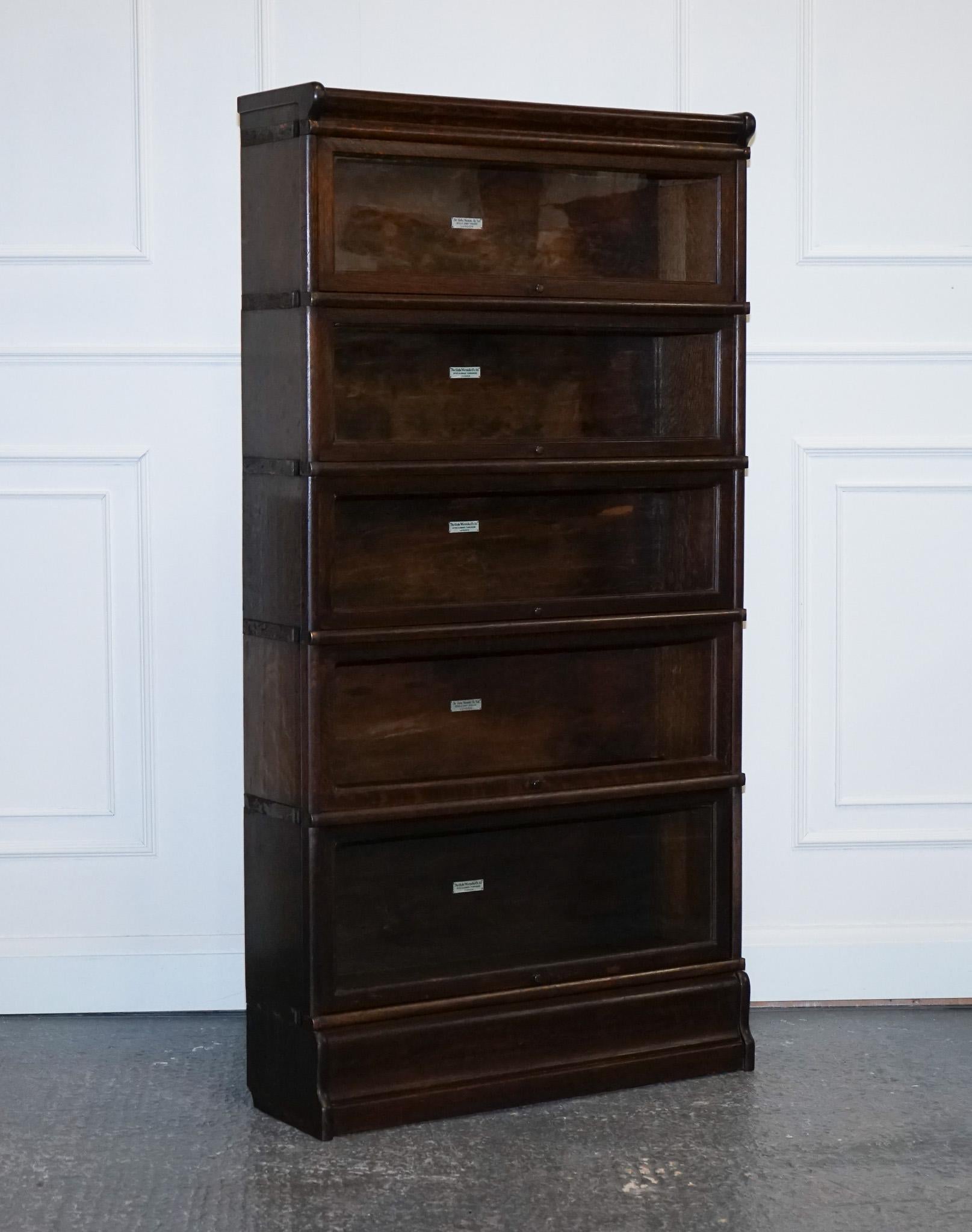 We are delighted to offer for sale this Beautiful 5 Tier Globe Wernicke Barrister Bookcase.

A set of 5 antique Globe Wernicke oak glass stacking library barrister modular bookcases would be a stunning addition to any home library or office space.