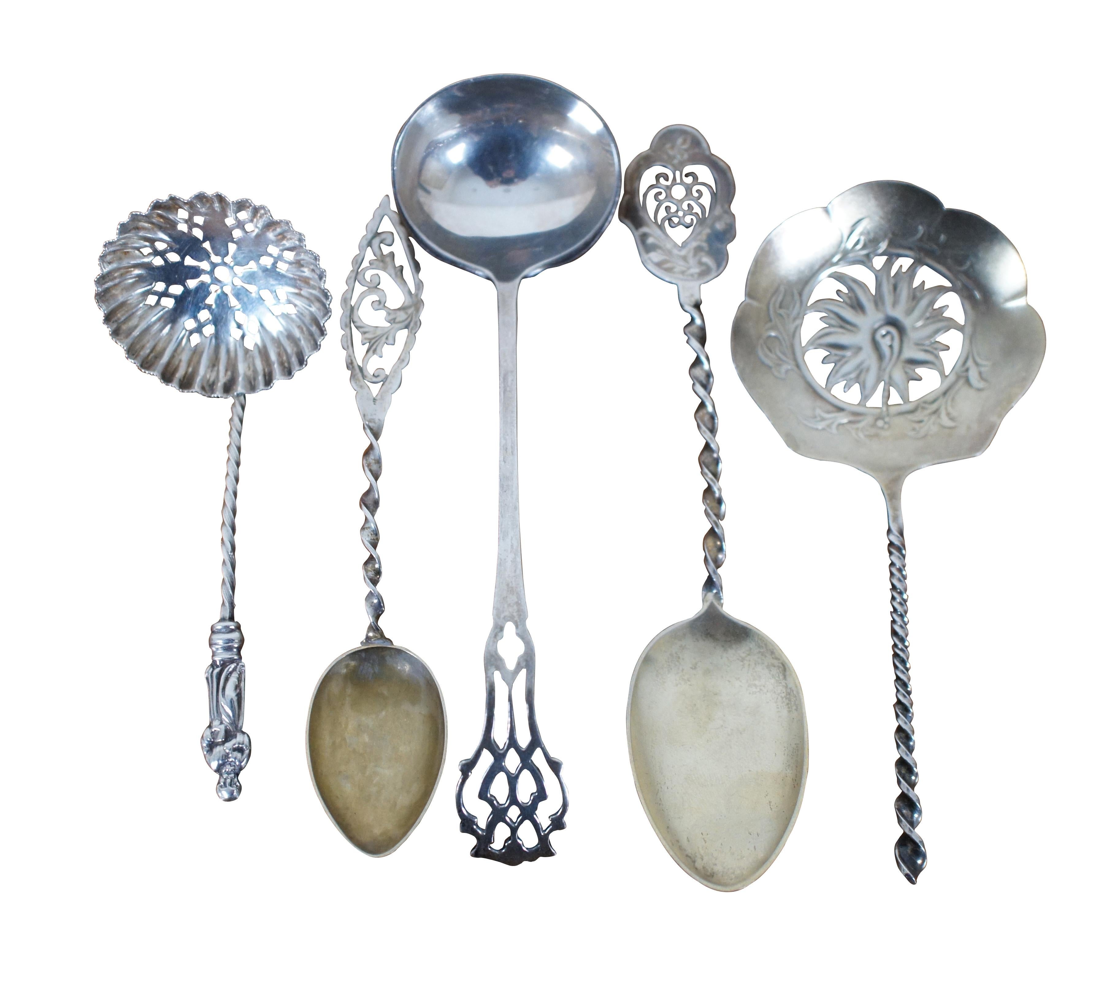 Lot of five sterling silver spoons with a variety of ornate twisted and reticulated handles, including two tea / coffee spoons, two pea / bon bon spoons, and one sauce ladle. Makers include Towle Silversmiths, Lunt Silversmiths, and William