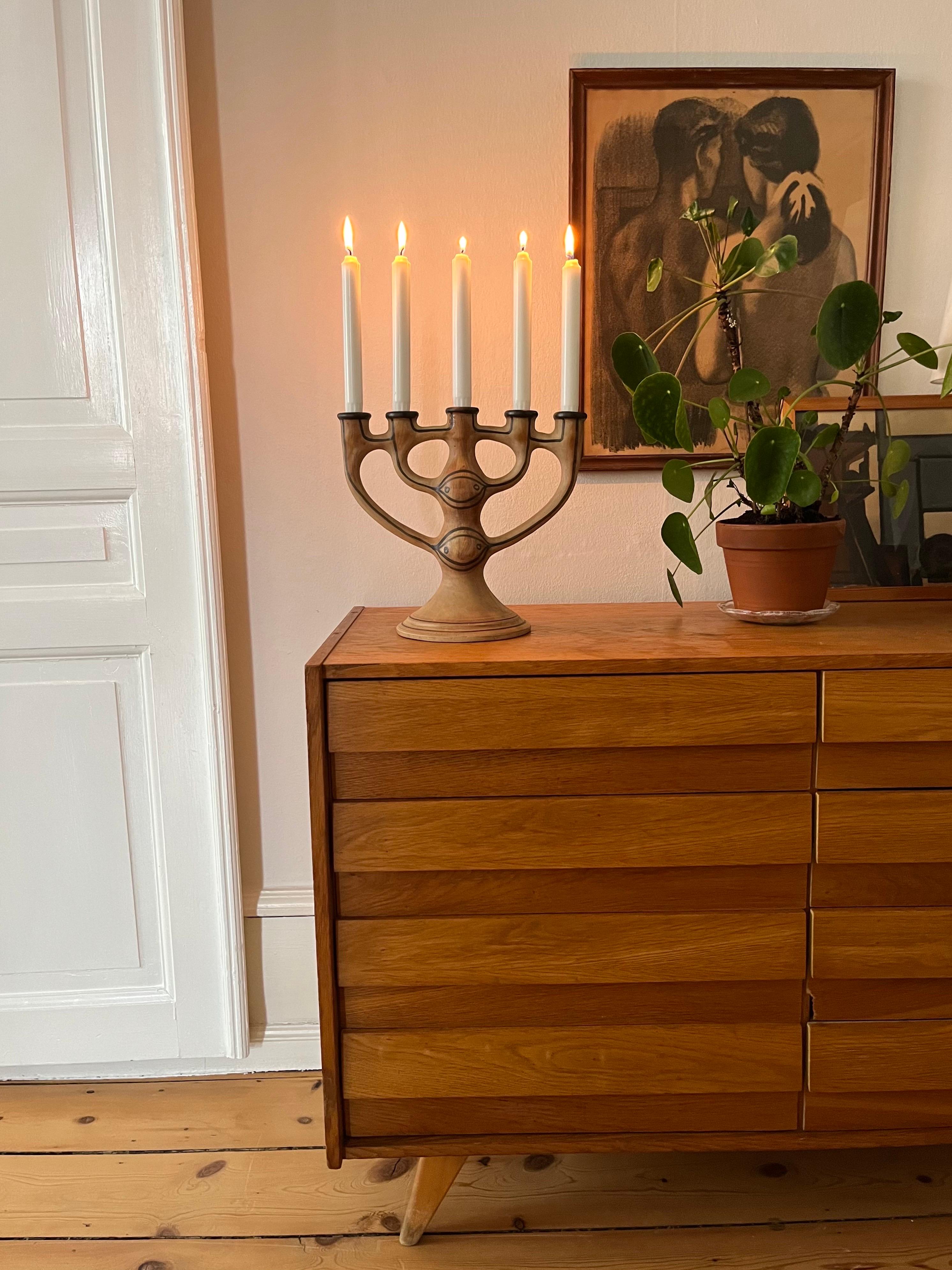 5-Arm Stoneware Candelabra by Asbo Stentøj, Denmark, 1980s

Playful yet elegant, this handcrafted 5-arm stoneware candelabra was made by Asbo Stentøj in Denmark during the 1980s. Featuring a matte stoneware finish, the piece showcases soft, organic