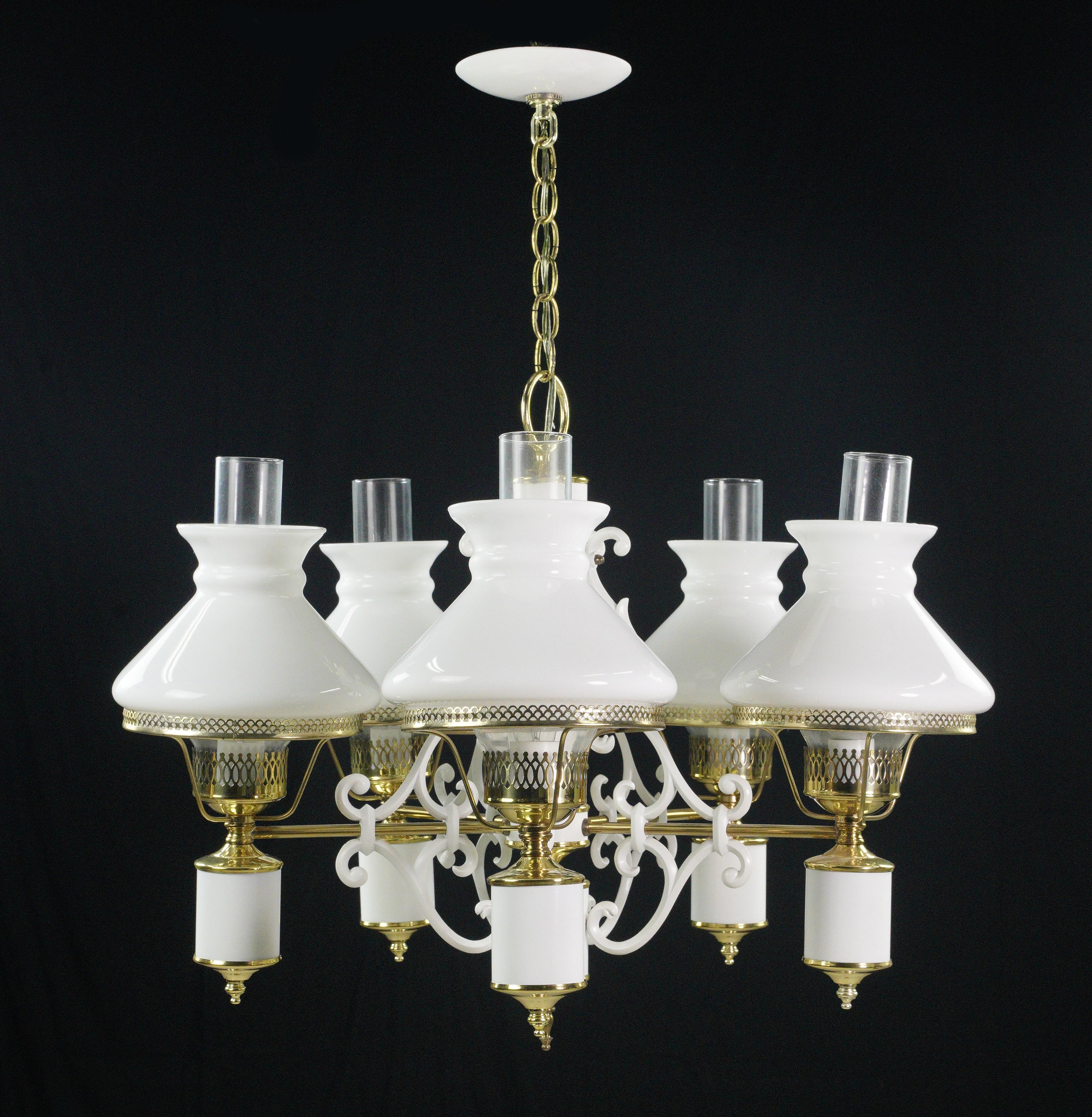 This Victorian style five arm chandelier is a masterpiece of vintage design. Its graceful arms adorned with white glass shades exude elegance, while the brass finish steel and white aluminum elements add a touch of sophistication, creating a