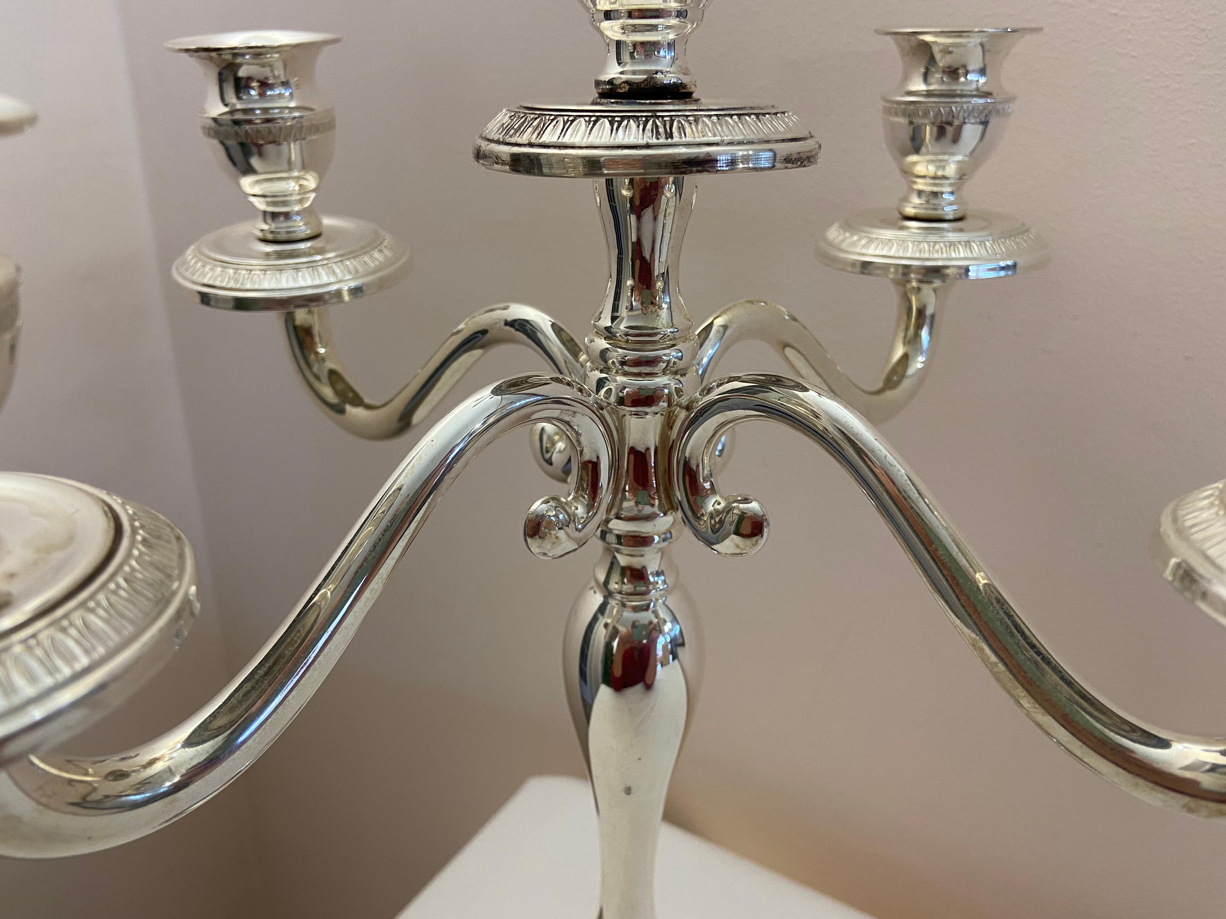 5 Armed Candelabra, 800 Silver, Empire Style.It weighs 625 grams.38 cm high, 32 cm wide. Supplied with candles.
Regularly stamped with state marks. I ship in an elegant gift box.