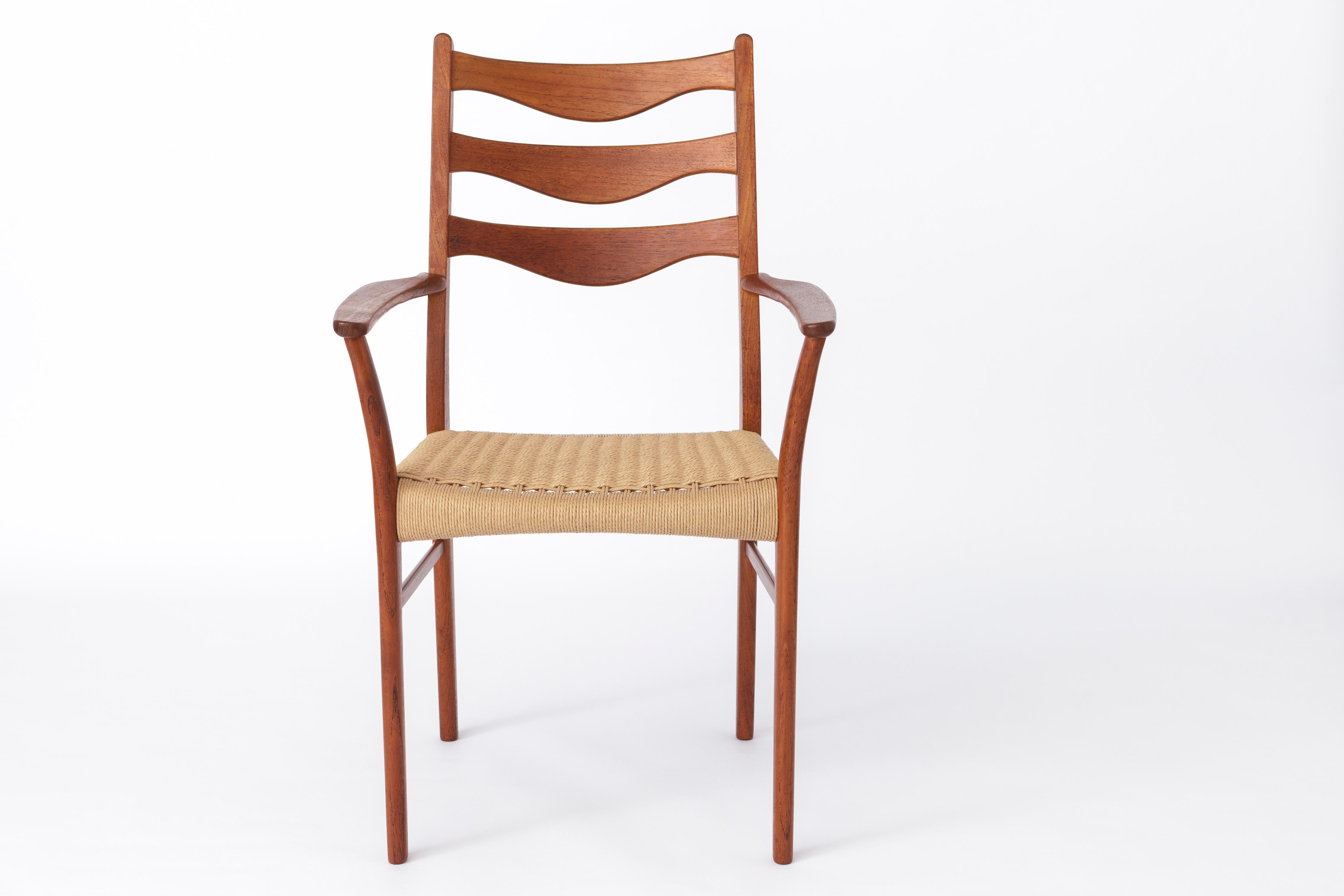 Mid-Century Modern 5 Arne Wahl Iversen Mid century teak dining chairs with papercord seat. For Sale