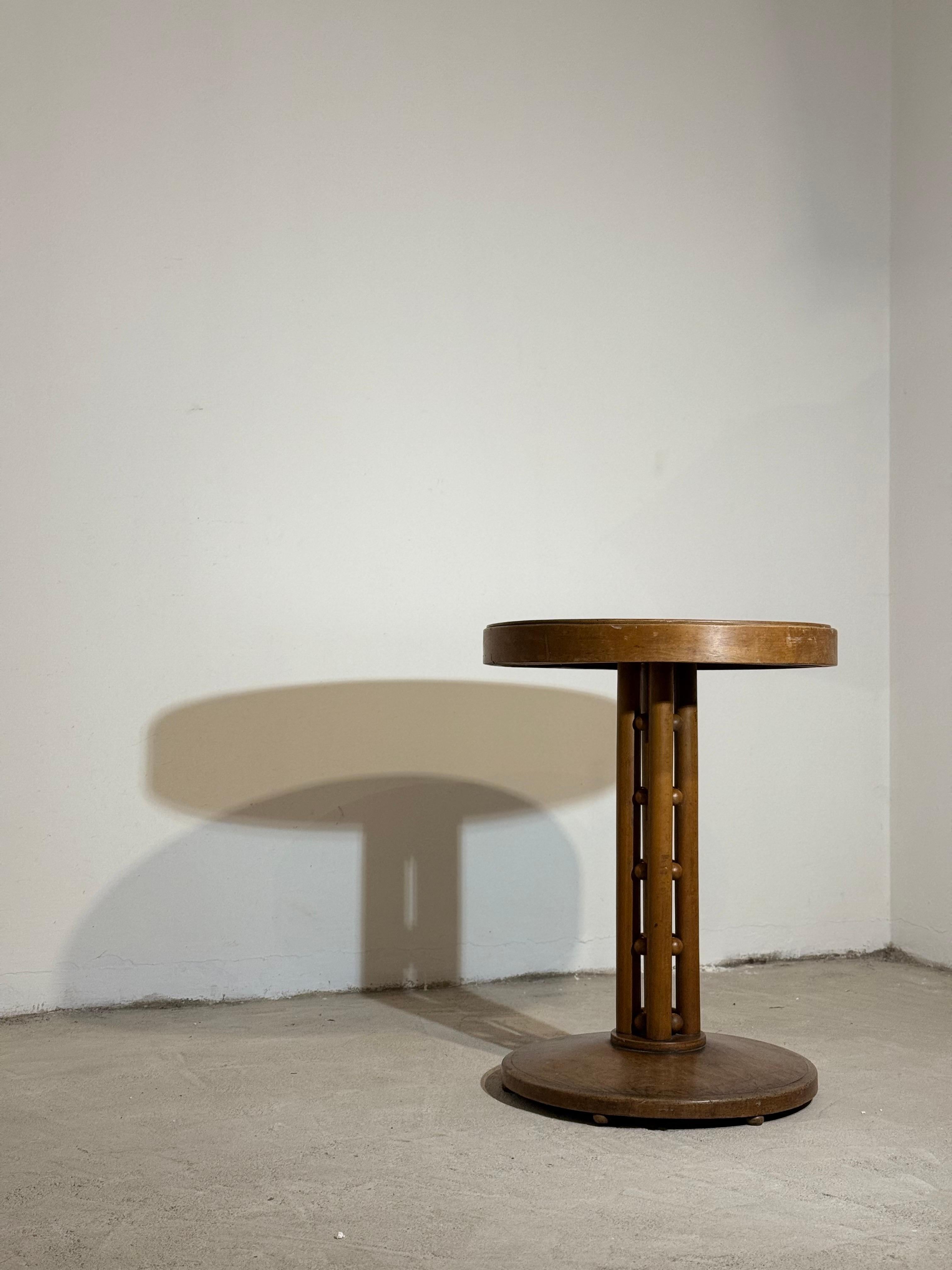 J. & J. Kohn, Model No. 1262 (1908)
Bent beech and plywood, original condition, never restored.

A rare and authentic example of early 20th-century Viennese design, this table (model no. 1262) by the renowned manufacturer J. & J. Kohn exemplifies