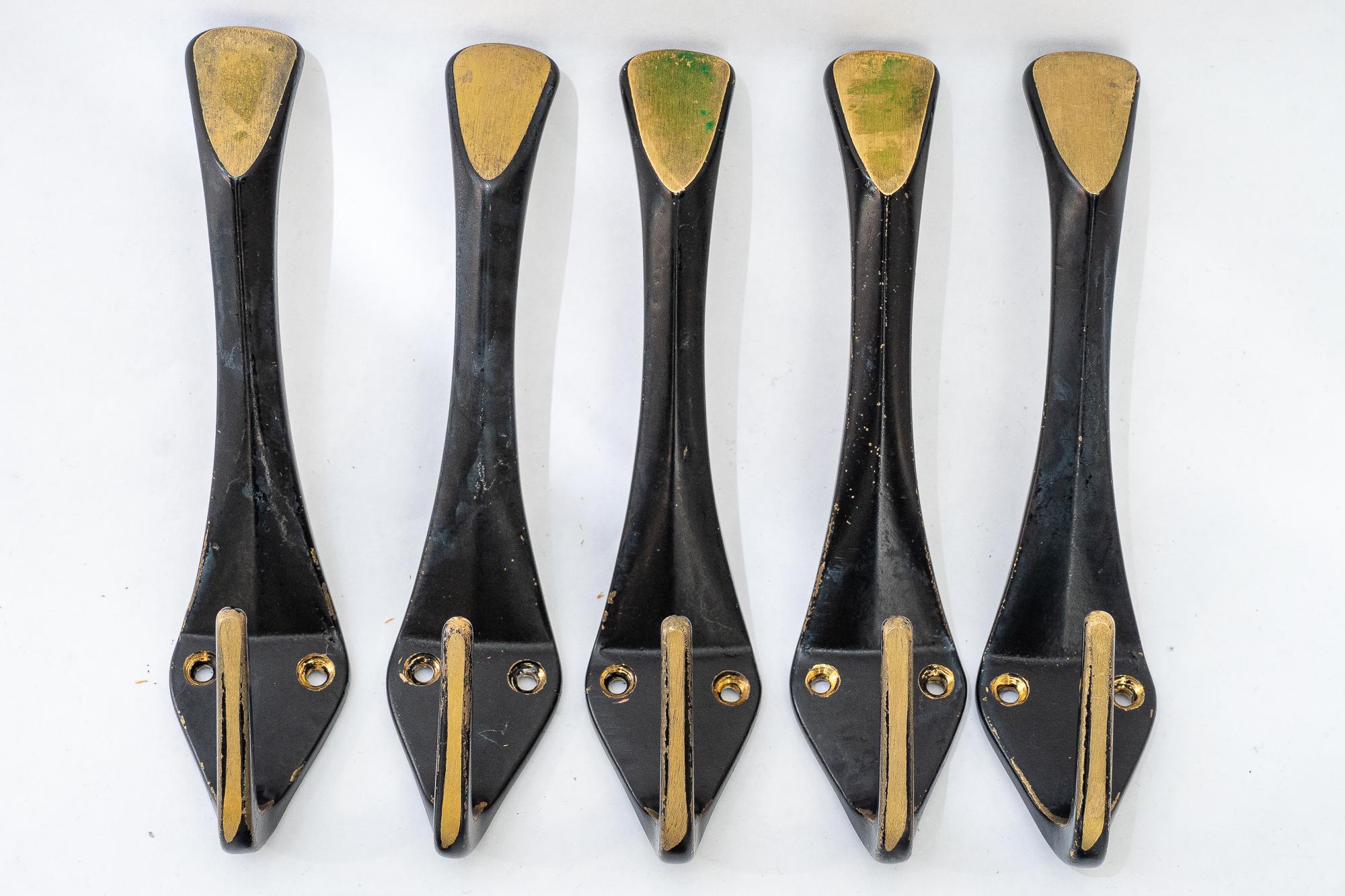 5 anzuelos grandes y 4 pequeños walter bosse viena hacia los años 50 Austríaco en venta