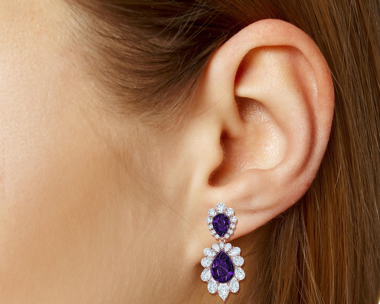 Have you eve looked through older magazines or jewelry books and see jewelry that just made in a different way to anything you see today?  This pair of  earrings breaks that mold.  Here are bespoke made Amethyst and Diamond earrings crafted from 18k