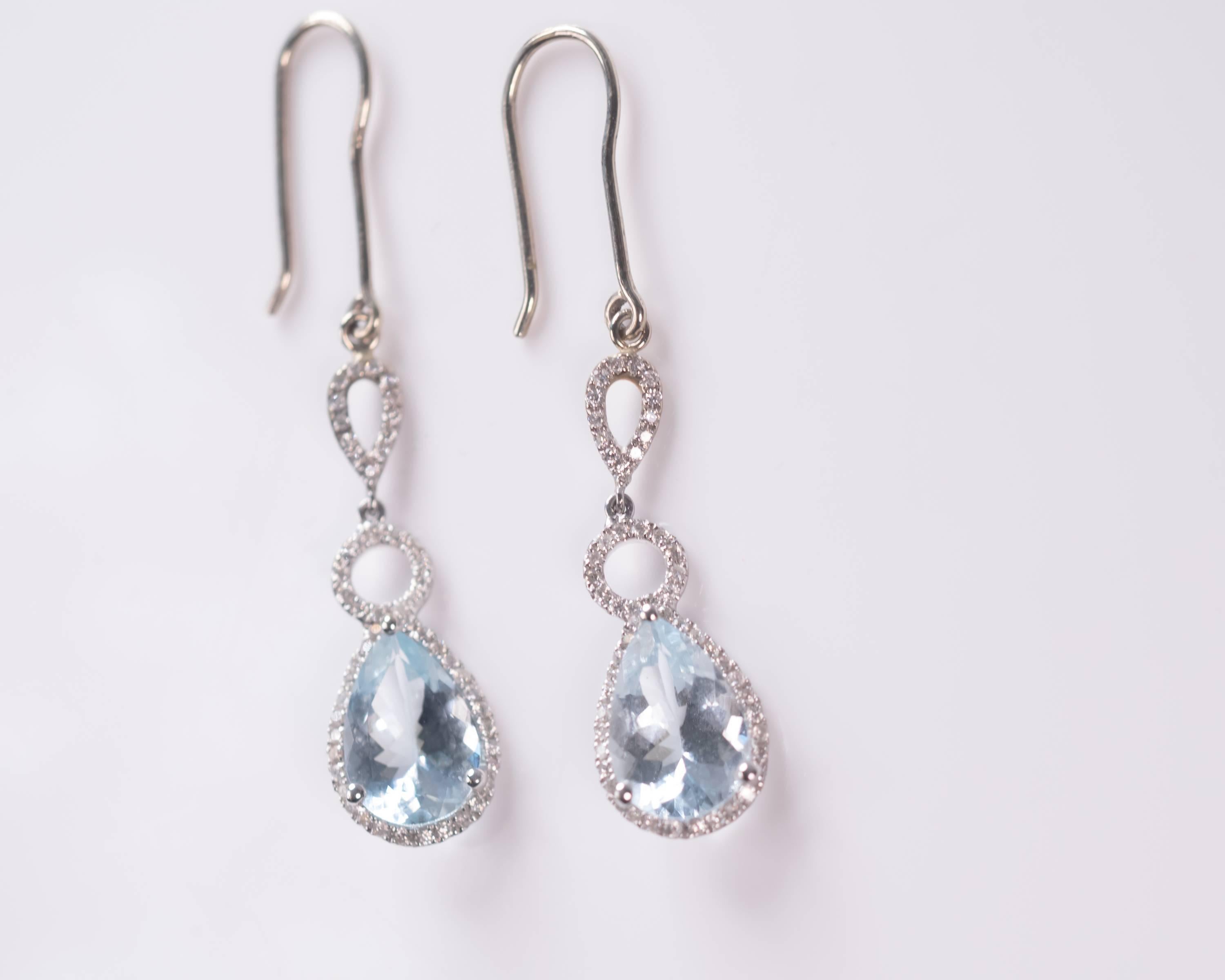 Pear Cut 5 Carat Blue Topaz and 0.40 Carat Diamond 18 Karat White Gold Drop Earrings