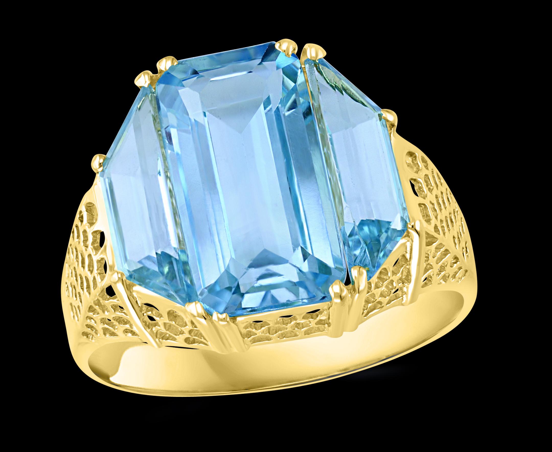 5 Carat Blue Topaz Cocktail Ring 14 Karat Yellow Gold, Estate Size 9
A classic, Cocktail ring 
Huge Approximately  5 Carat of   Blue Topaz  Good Quality ,Emerald cut shape , full of luster and shine but light in color .
Please look at all the