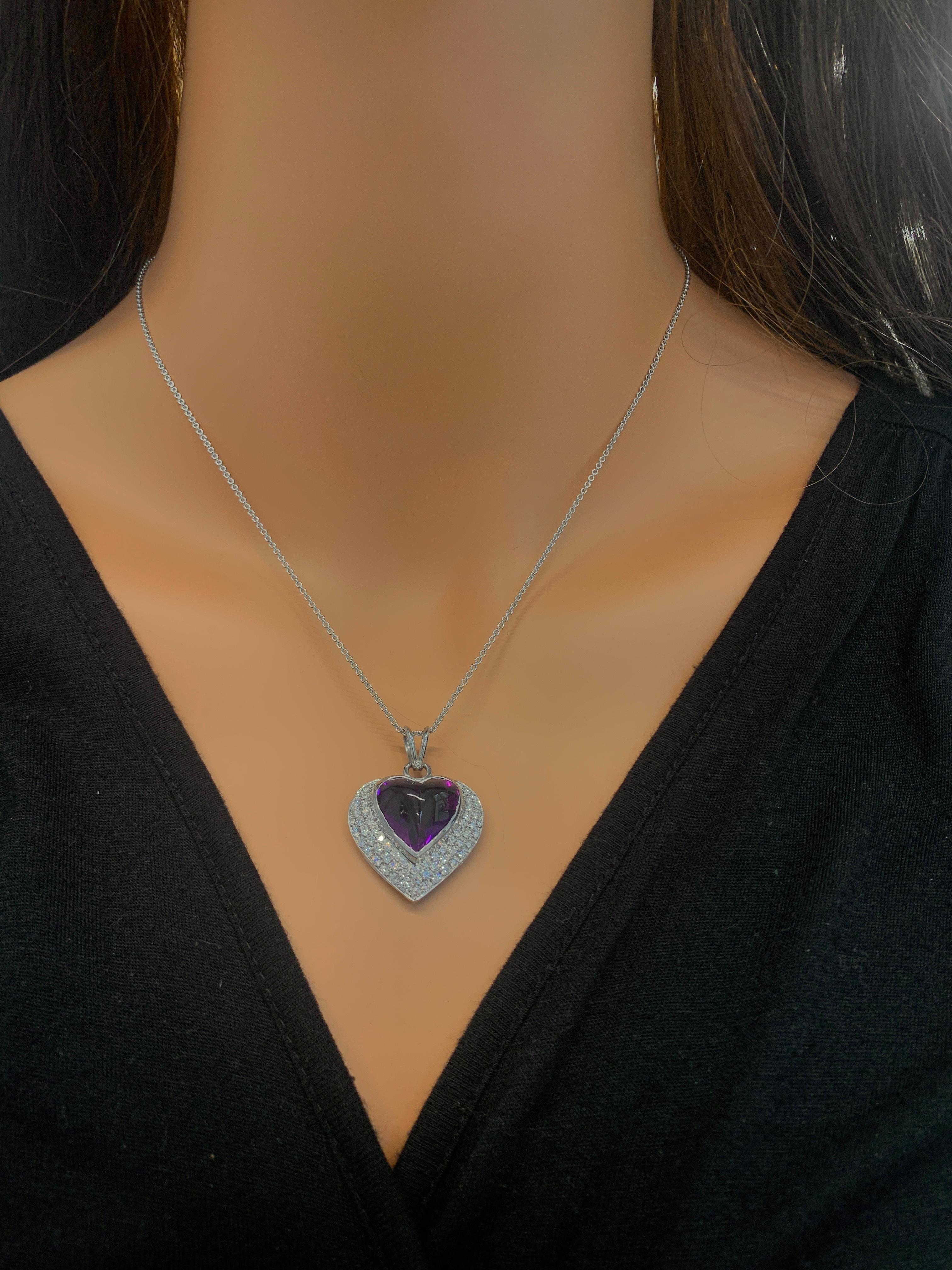 Amethyst is the birthstone for February and is a sought-after semi-precious gemstone for those who love purple. This brightly polished 14k white gold pendant features a Cabochon heart-shaped vibrant purple amethyst weighing 5.00 carats in the