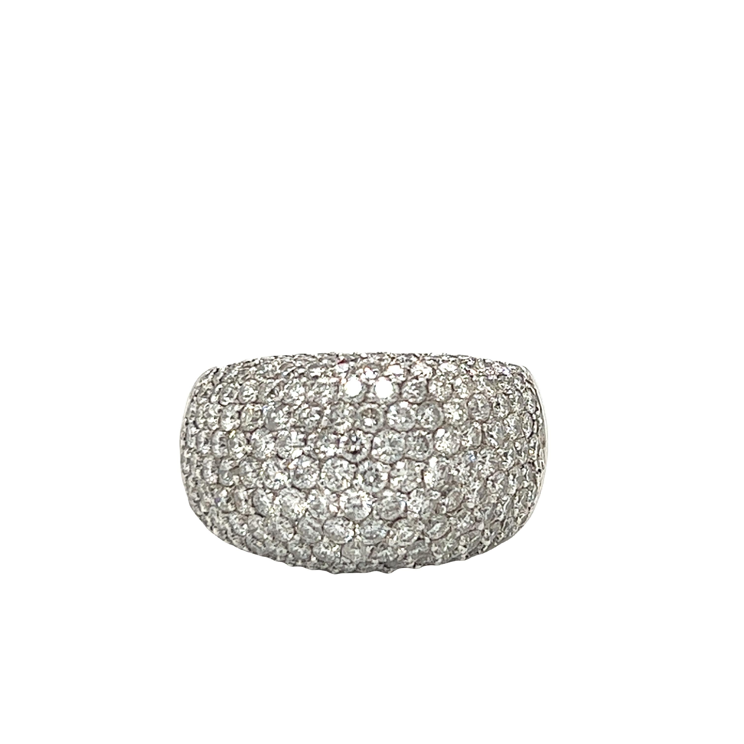 Gorgeously sparkling cocktail ring features 5 carats of round brilliant diamonds pave-set in luxurious 18k white god. Resizable.

Ring size: 8
Metal: 18K White Gold
Weight: 12.2 grams
Diamond color: G
Diamond clarity: VS
Width: 13 mm
Height: 6.1