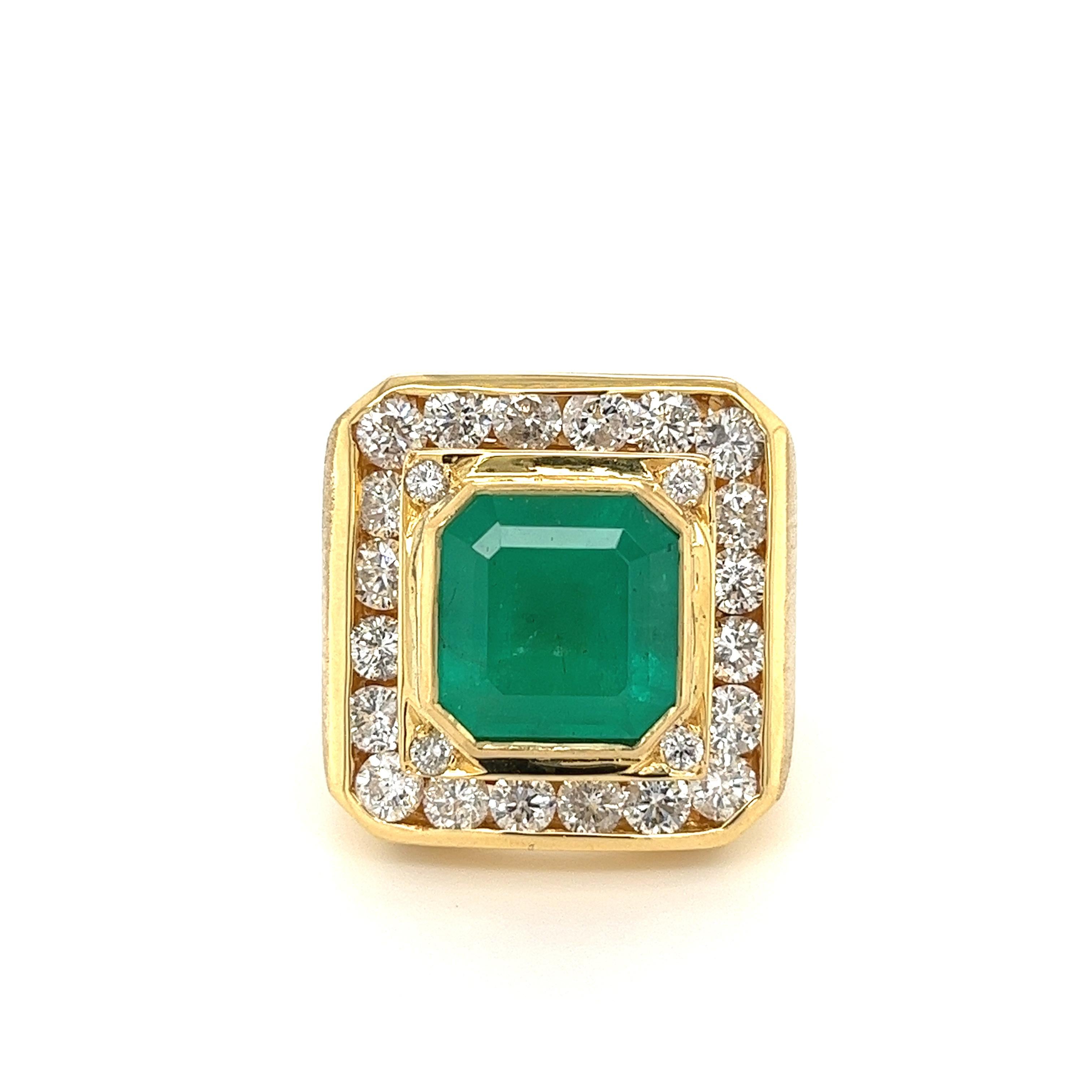 Top-quality vintage natural Emerald men's ring. This vibrant Colombian Emerald bears excellent luster and brilliance. Bezel set, with a gallery-back for breathability and comfort during wear. 

Emerald has Colombian origins, as it was mined over 20