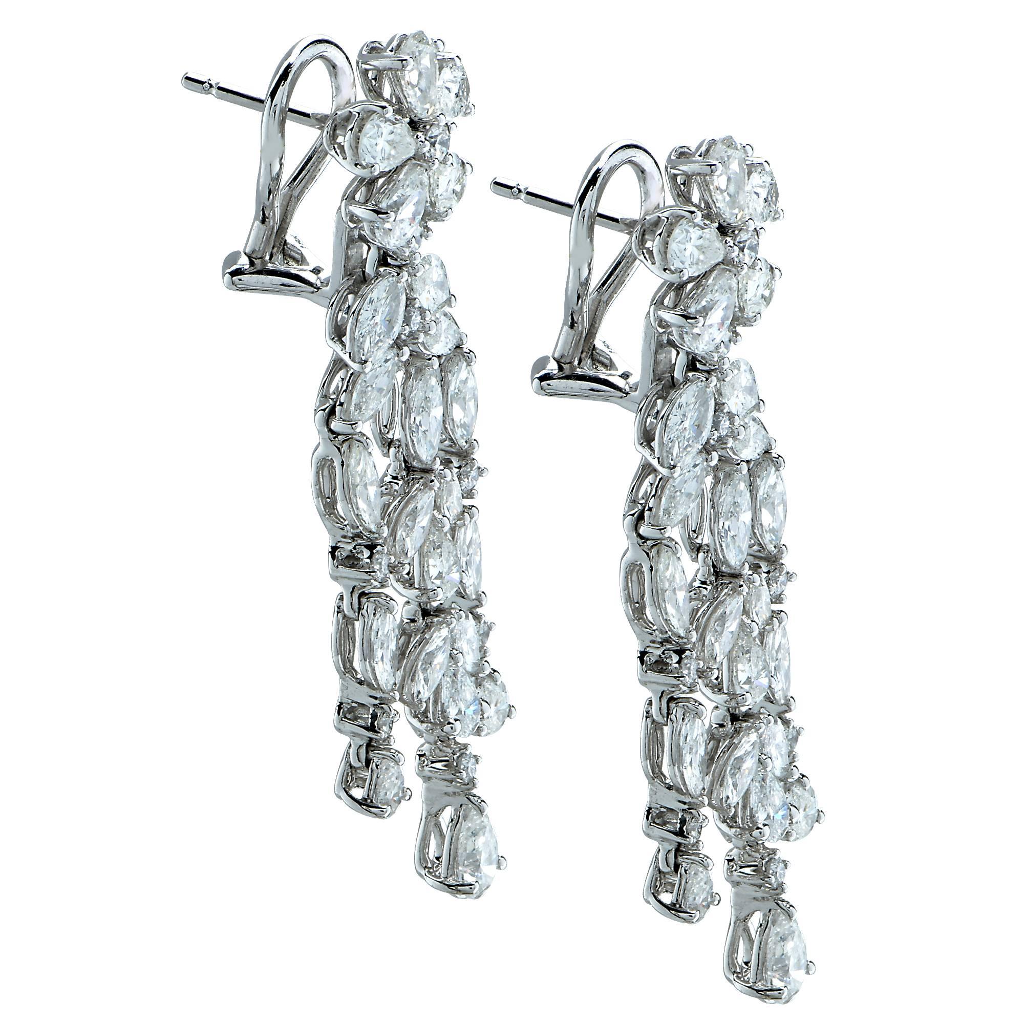 Dazzling diamond dangle earrings comprising a stunning collection of 62 round brilliant cut, marquees cut and pear shape diamonds, with a total estimated weight of approximately 5 Carats, set in 18k white gold. 

Our pieces are all accompanied by an