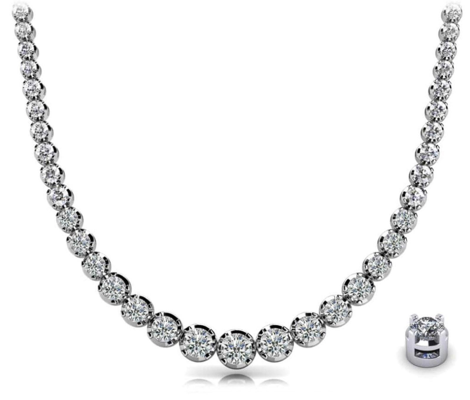 This graduated tennis choker necklace is crafted in platinum 850 and features a total of 5.0 carats of natural diamonds, arranged in a graduated style. The necklace is 16 inches in length, and weighs 26.72 grams. 

Details: 
Item Type: Tennis Choker
