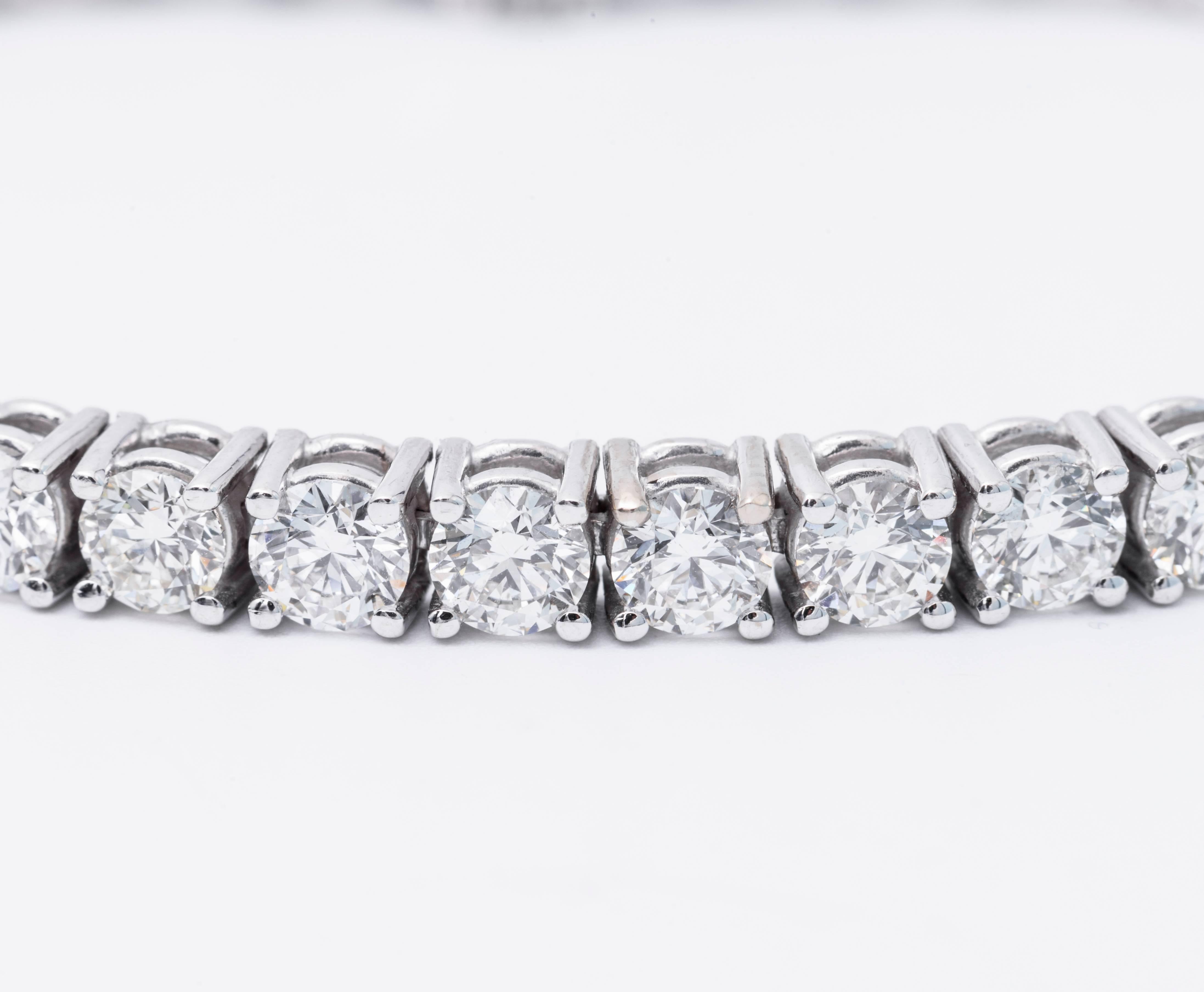 14 Karat White Gold diamond tennis bracelet featuring round brilliants weighing 5 Carats.
Color G-H
Clarity SI

Can be made in 18 Karat White Gold or Yellow Gold
DM for pricing.

In stock 1-22 Carat Tennis bracelets.
