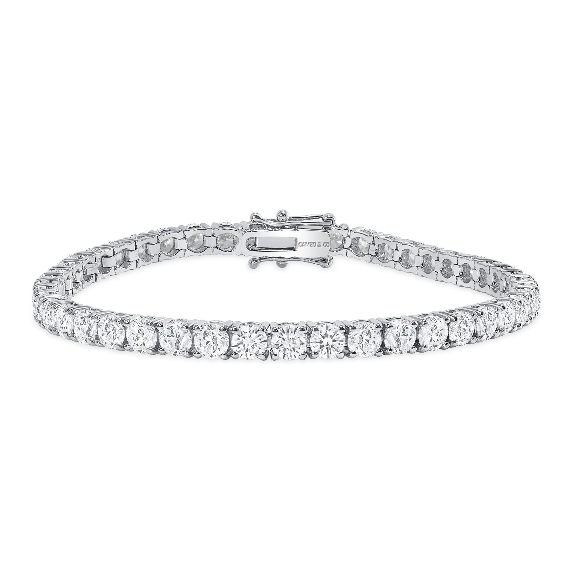 This diamond tennis bracelet features beautifully cut round diamonds set gorgeously in 14k gold.

Metal: 14k Gold
Diamond Cut: Round Natural Diamond 
Total Diamond Carats: 5ct
Diamond Clarity: VS-SI
Diamond Color: F-G
Color: White Gold, Yellow Gold,