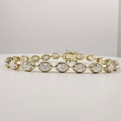 5 Carat East-West, Bezel Set, Oval Diamond Tennis Bracelet in 14K Yellow Gold