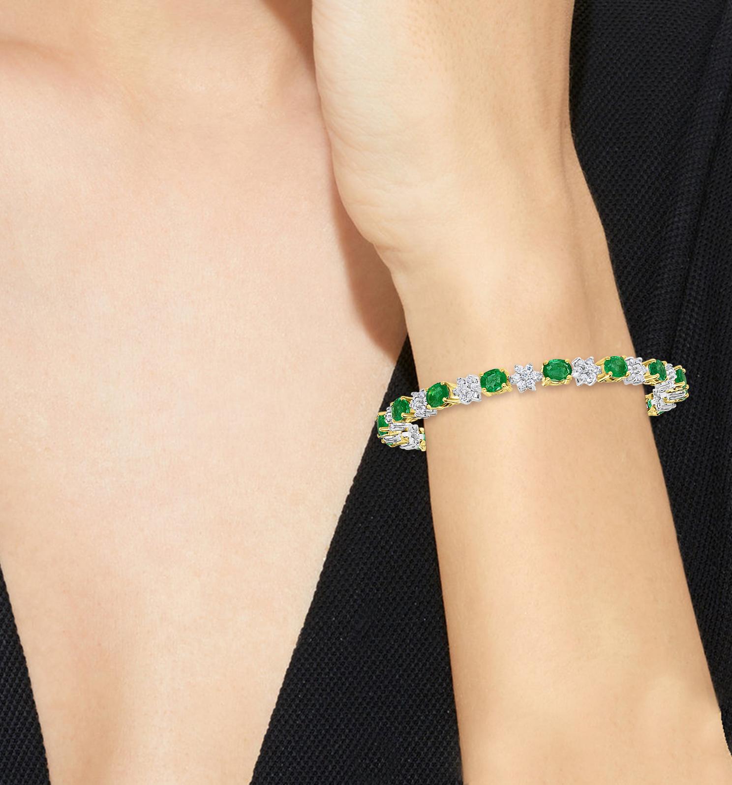 Oval Cut 5 Carat Emerald And 2.2 Carat Diamond Flower Tennis Bracelet 14 Karat White Gold