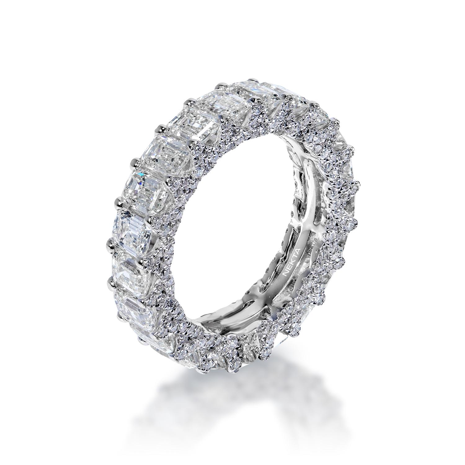 Shared from Emerald Cut eternity band,with diamond encrusted prongs



Diamond:
Carat Weight: 4.76 Carats
Style: Emerald Cut

Accent Diamonds:
Carat Weight: 0.73 Carats
Shape: Round Brilliant Cut
Setting: Shared Prong & Pave
Metal: 14 Karat White