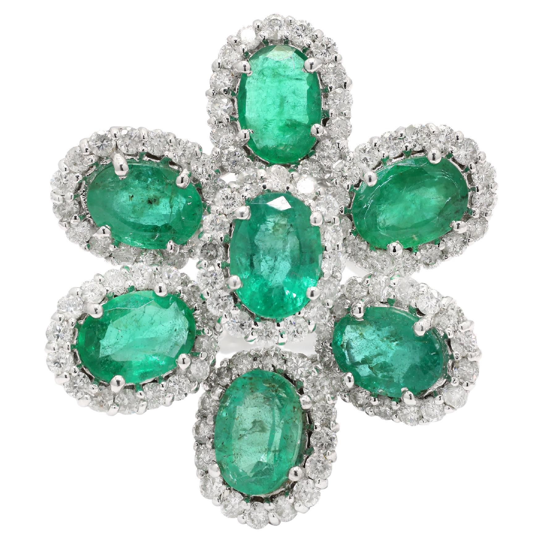 For Sale:  Statement 5 ct Emerald Flower Ring with Halo Diamonds in 14 Karat White Gold