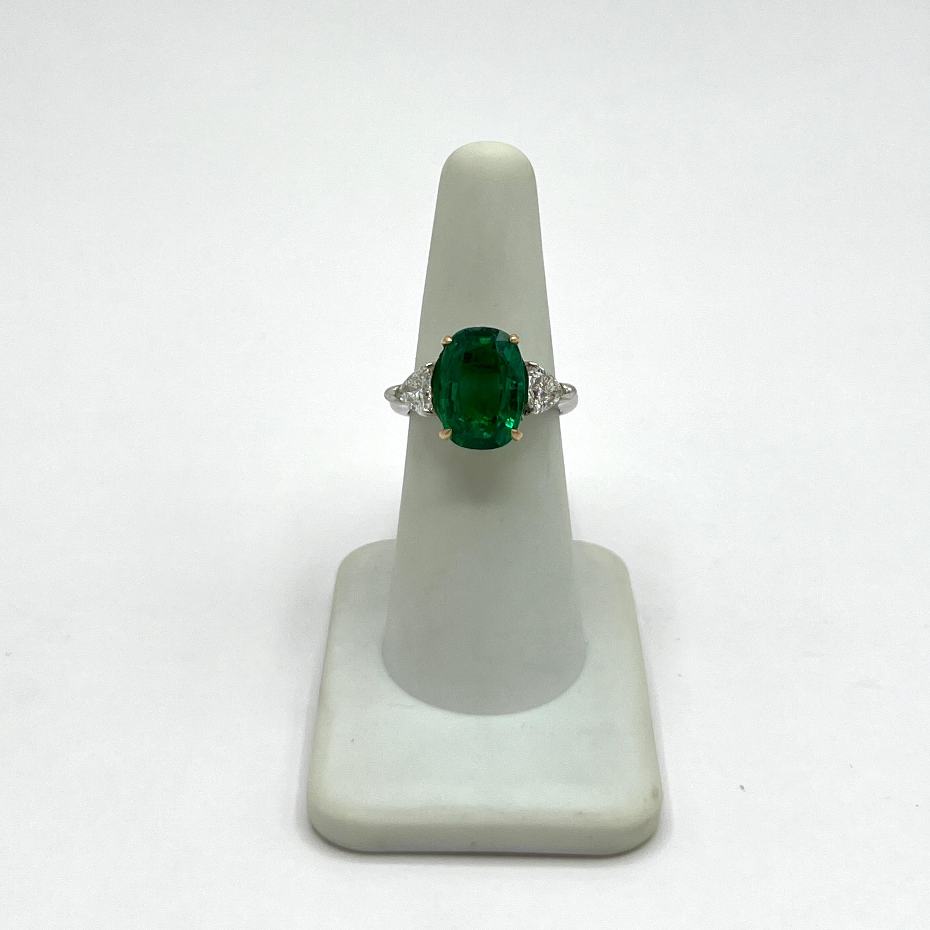 Women's or Men's 5 Carat Emerald Oval and Diamond Trillion Ring in 18K 2 Tone Gold For Sale