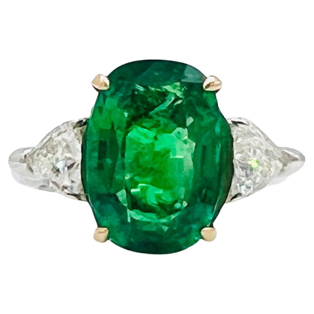 5 Carat Emerald Oval and Diamond Trillion Ring in 18K 2 Tone Gold For Sale