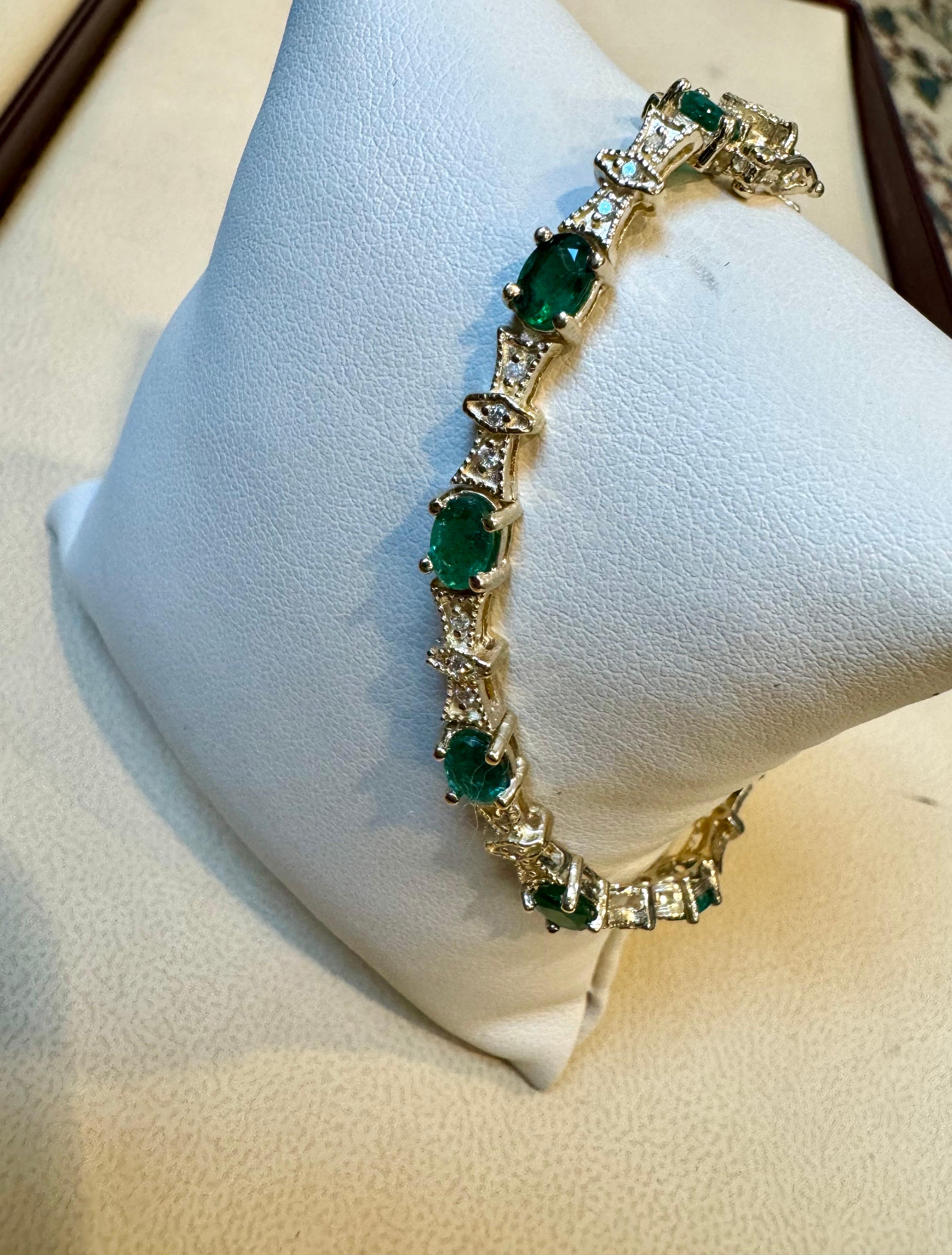  This exceptionally affordable Tennis  bracelet has 10 stones of oval  Emeralds  . Each Emerald is spaced by a big link.  
 Total weight of Emerald is  Approximately 5 carat. 
there are no diamonds , just simple and elegant bracelet
The bracelet is