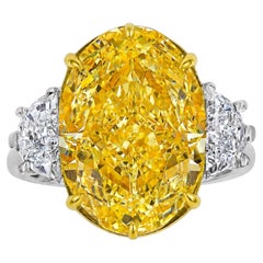 5 Carat Fancy Intense Yellow Oval Diamond Three Stone Engagement Ring