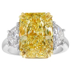 5 Carat Fancy Light Yellow Elongated Radiant Diamond Three Stone Ring