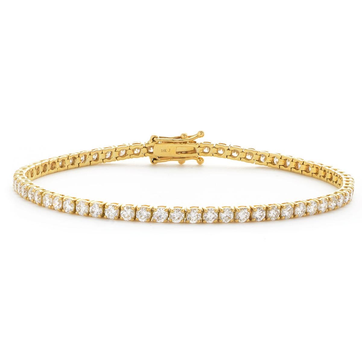 Moderne Bracelet tennis Riviera ligne à quatre griffes en or 18 carats avec diamants ronds de 5 carats en vente
