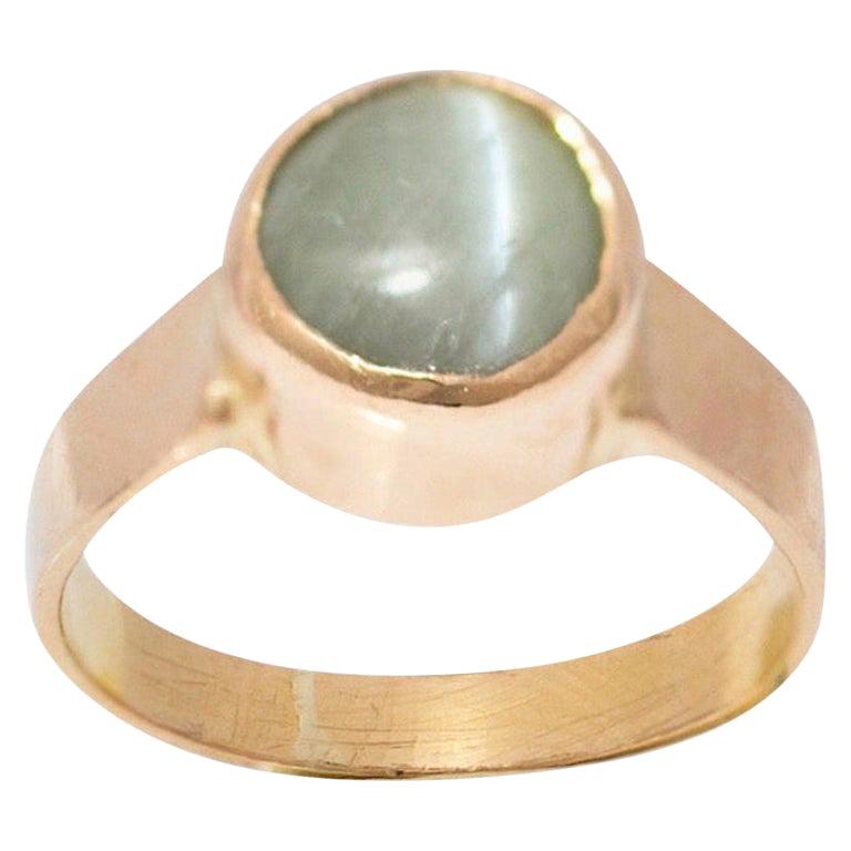 5 Carat Green Chrysoberyl Cat
s Eye 18 Carat Yellow Gold Ring