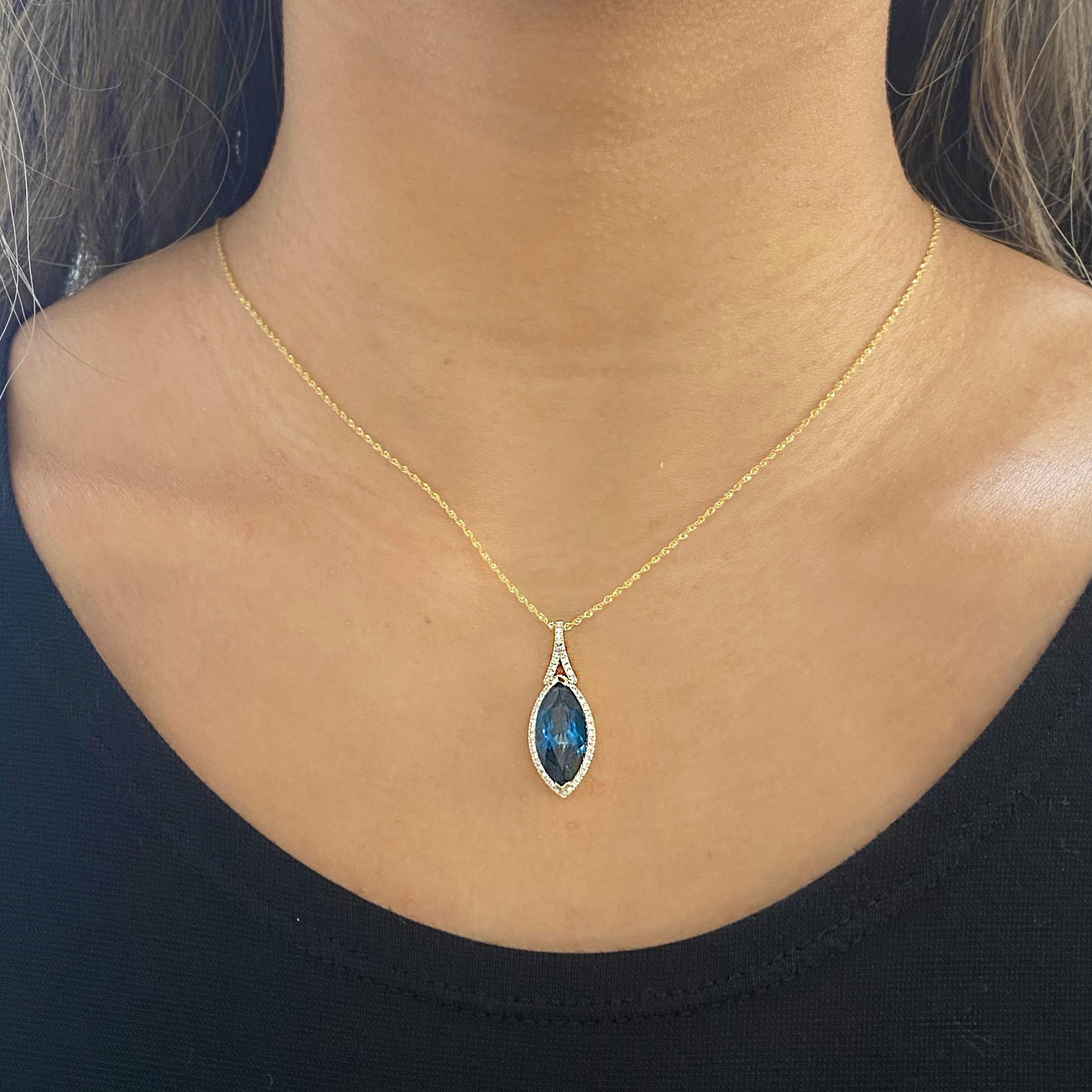 This vibrant London Blue Topaz contrasts perfectly with the yellow gold to create a fun and unique design that would catch anybody's eye. Whether it's a gift or for yourself, this necklace is special. The details for this beautiful necklace are