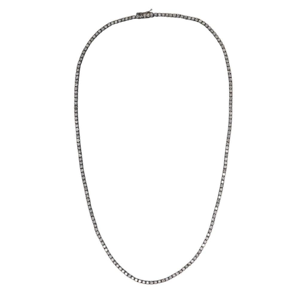 This breathtaking 5ct natural diamond necklace is a true masterpiece, designed to elevate any ensemble with its stunning sparkle and sophisticated style. The necklace features a continuous line of dazzling round brilliant cut diamonds, all expertly