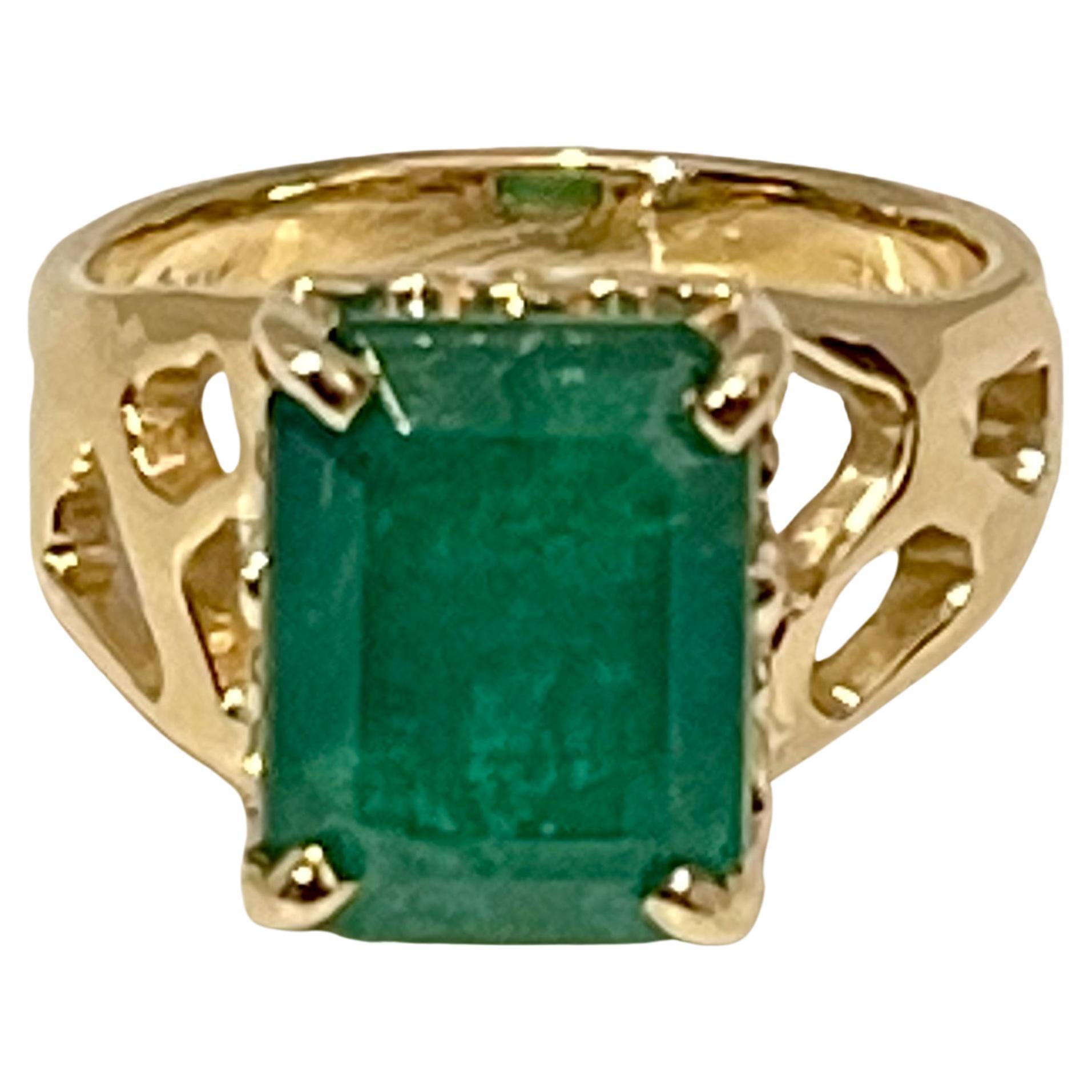 Yellow Gold Tension Set Emerald Cut Diamond Solitaire Ring For Sale at