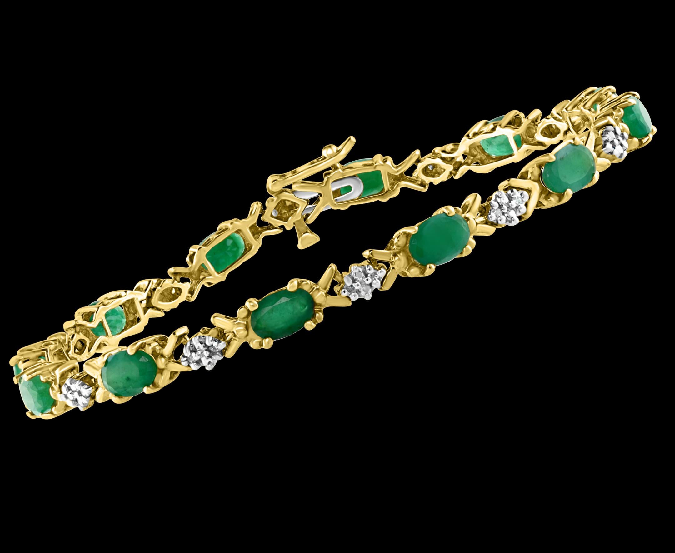 Oval Cut 5 Carat Emerald Tennis Bracelet 10 Karat Yellow Gold with Diamond Accent