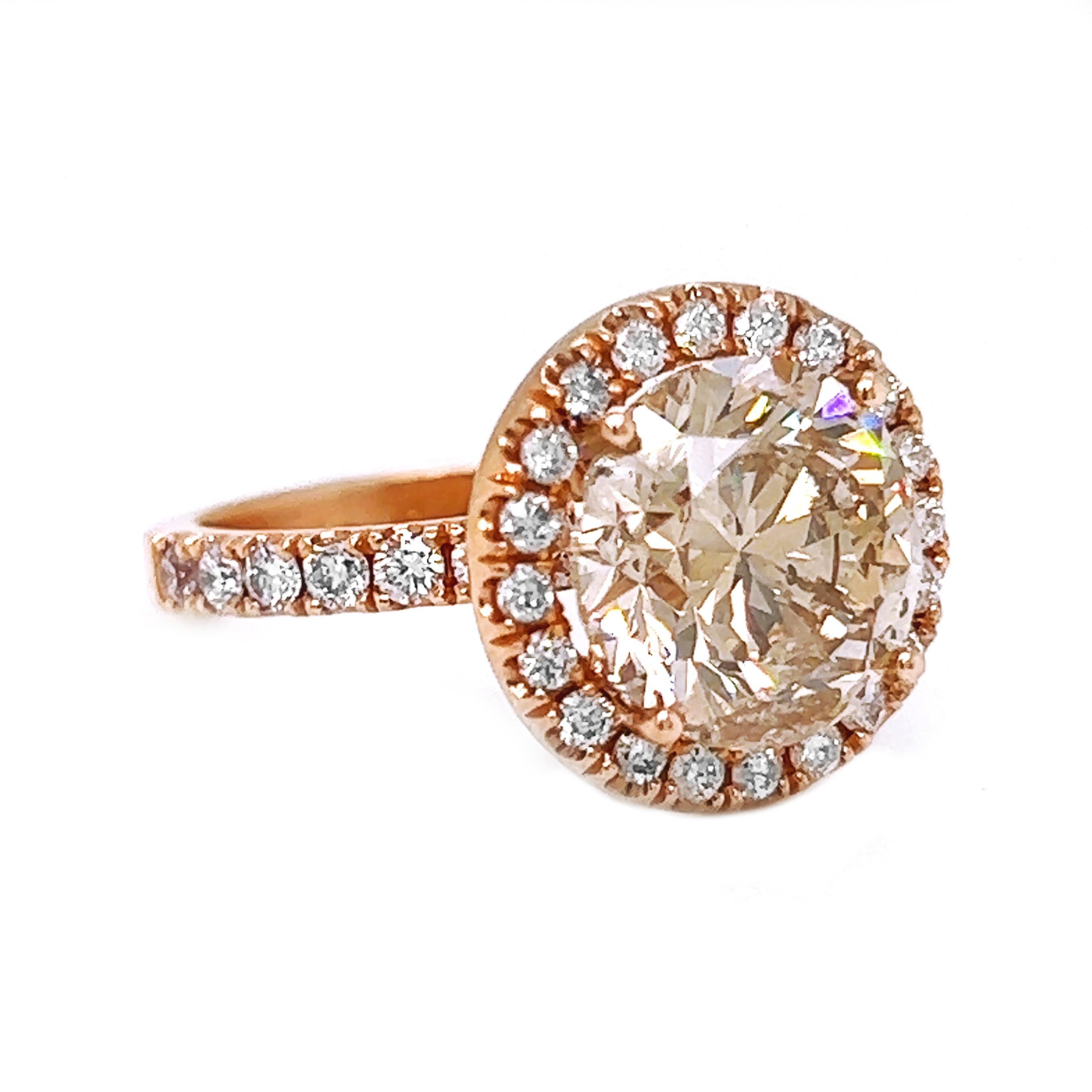 What makes this piece truly unique and special is the remarkable combination of elements that come together to create an extraordinary piece of jewelry:

1. 5 Carat Natural Mined Cognac Light Brown Diamond: The centerpiece of this ring is a sizable
