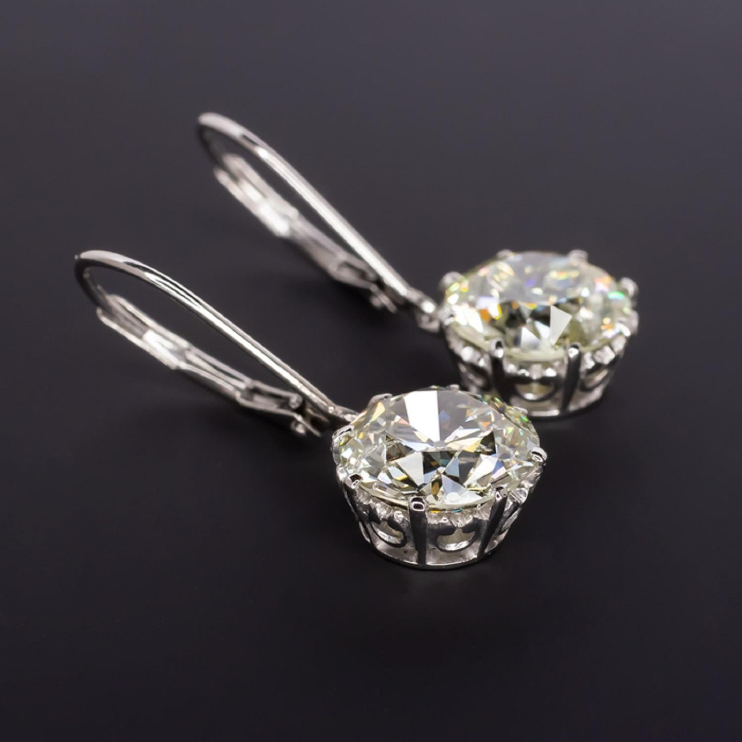 5.08ct antique matched pair of old European cut diamonds is dazzling with phenomenal sparkle, beautifully clean, and exceptionally clean with VS1-VS2 clarity! These diamonds are exceptionally well cut with fantastic brilliance and fire! Dazzling