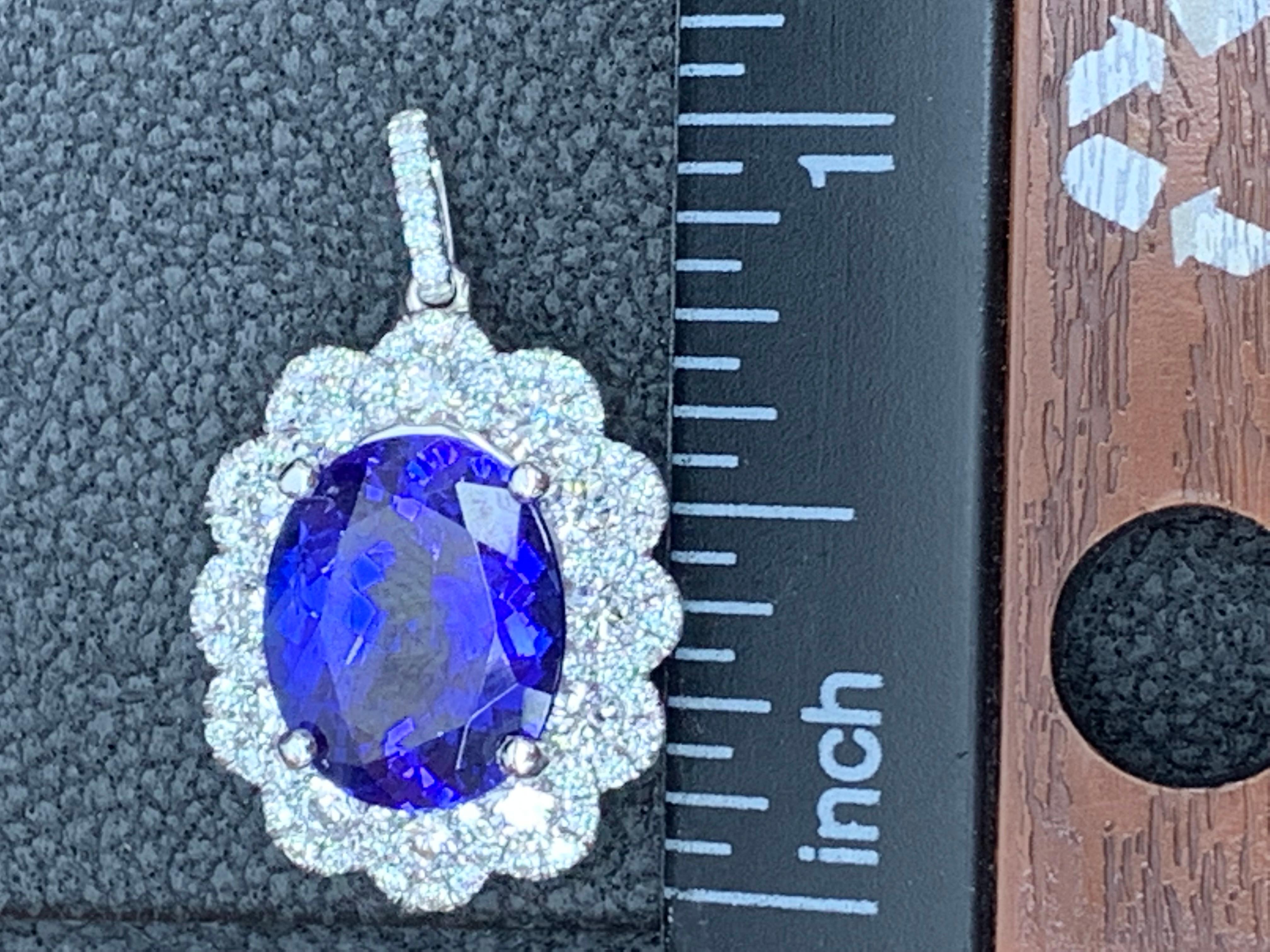 5 Carat Oval Cut Tanzanite and Diamond Halo Flower Pendant Necklace For Sale 6
