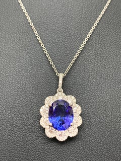5 Carat Oval Cut Tanzanite and Diamond Halo Flower Pendant Necklace