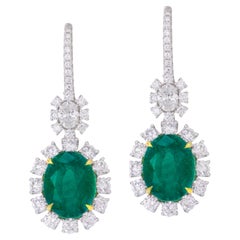 Orecchini a cerchio con smeraldo ovale da 5 carati in platino e giallo 18 carati ref618