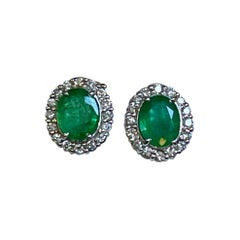 5 Carat Oval Shape Emerald and Diamond Omega Back Earrings 14 Karat White Gold