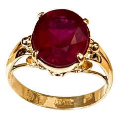 5 Carat Oval shape Treated Ruby 14 Karat Yellow Gold Ring