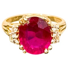 5 Carat Oval Shape Treated Ruby 14 Karat Yellow Gold Ring