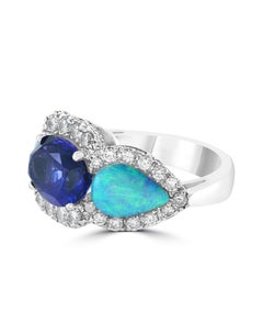 5 Carat Oval Tanzanite, Diamond and Opal Ring 14 Karat White Gold, Estate